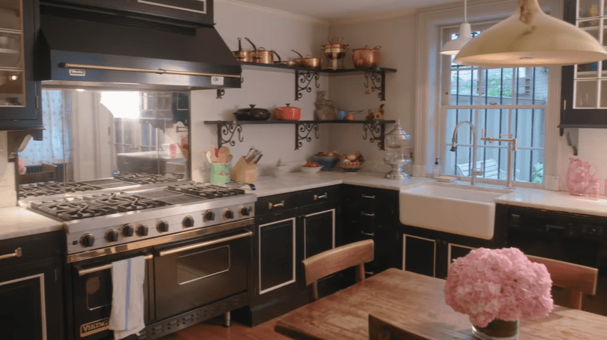 The kitchen has stainless steel |  Source: YouTube/Architectural Digest