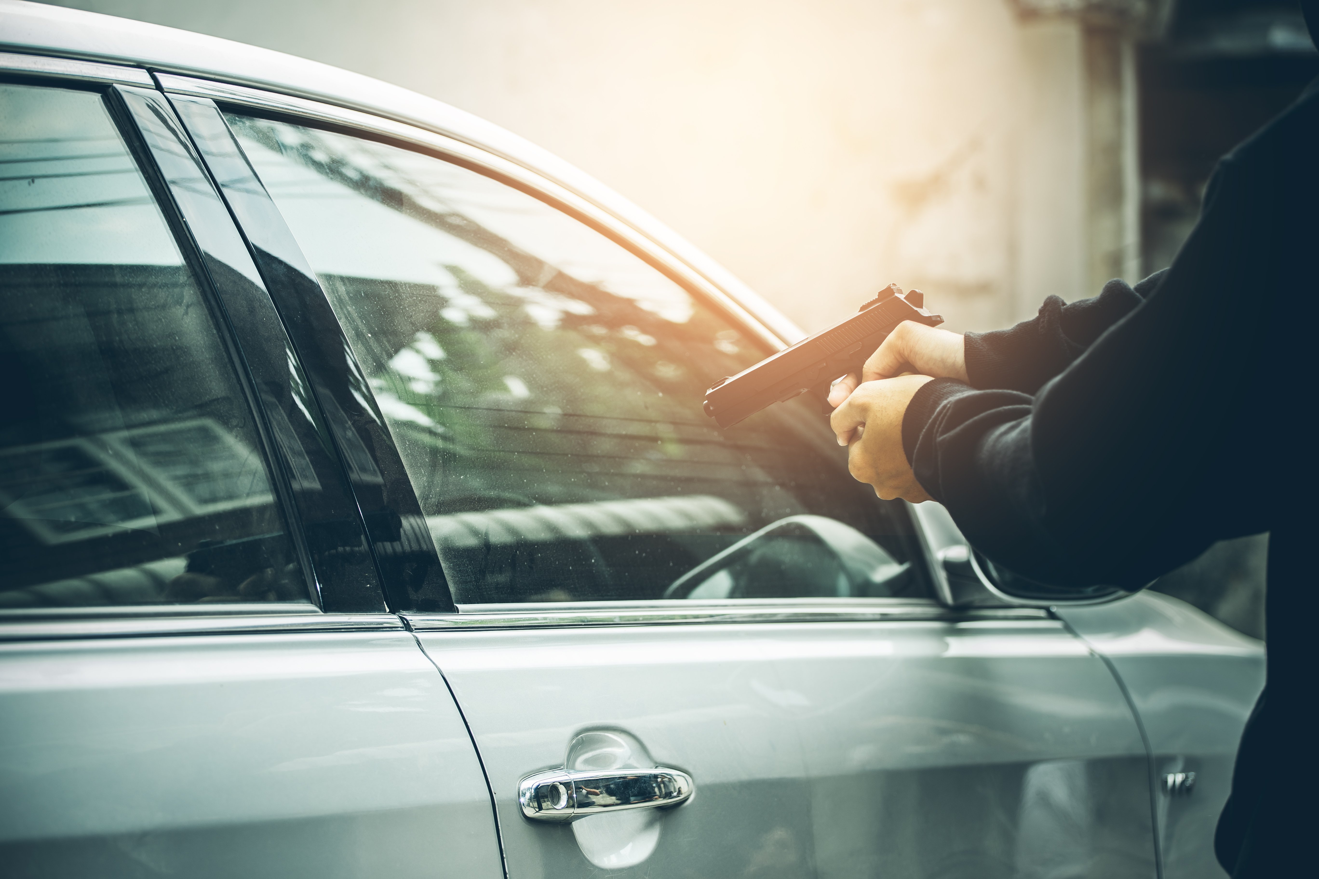 A car hijacking taking place. | Photo: Shutterstock