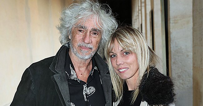 Louis Bertignac et Laetitia Brichet assistent à la performance "Tosca - Opera en Plein Air" aux Invalides le 04 septembre 2019 à Paris, France. | Photo : Getty Images