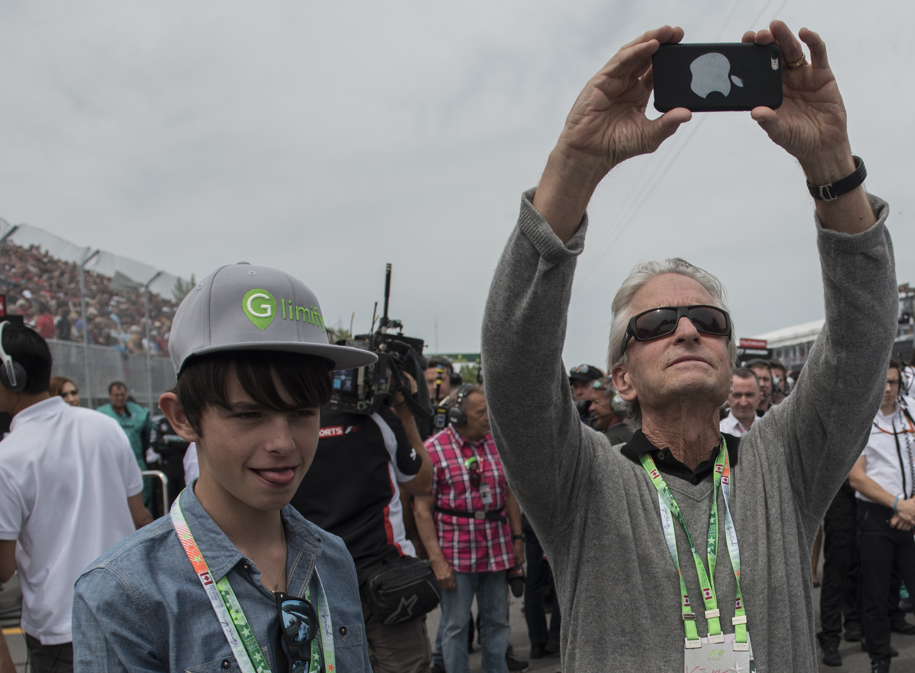 Michael Douglas and his son Dylan before the start of the race at the Formula One World Championship at the 2015 Canadian Grand Prix | Source: Getty Images