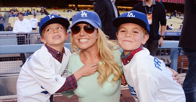 Britney Spears poses with sons Jayden James Federline (L) and Sean Preston Federline (R) at Dodger Stadium on April 17, 2013, in Los Angeles, California | Photo: Jon SooHoo/LA Dodgers/Getty Images