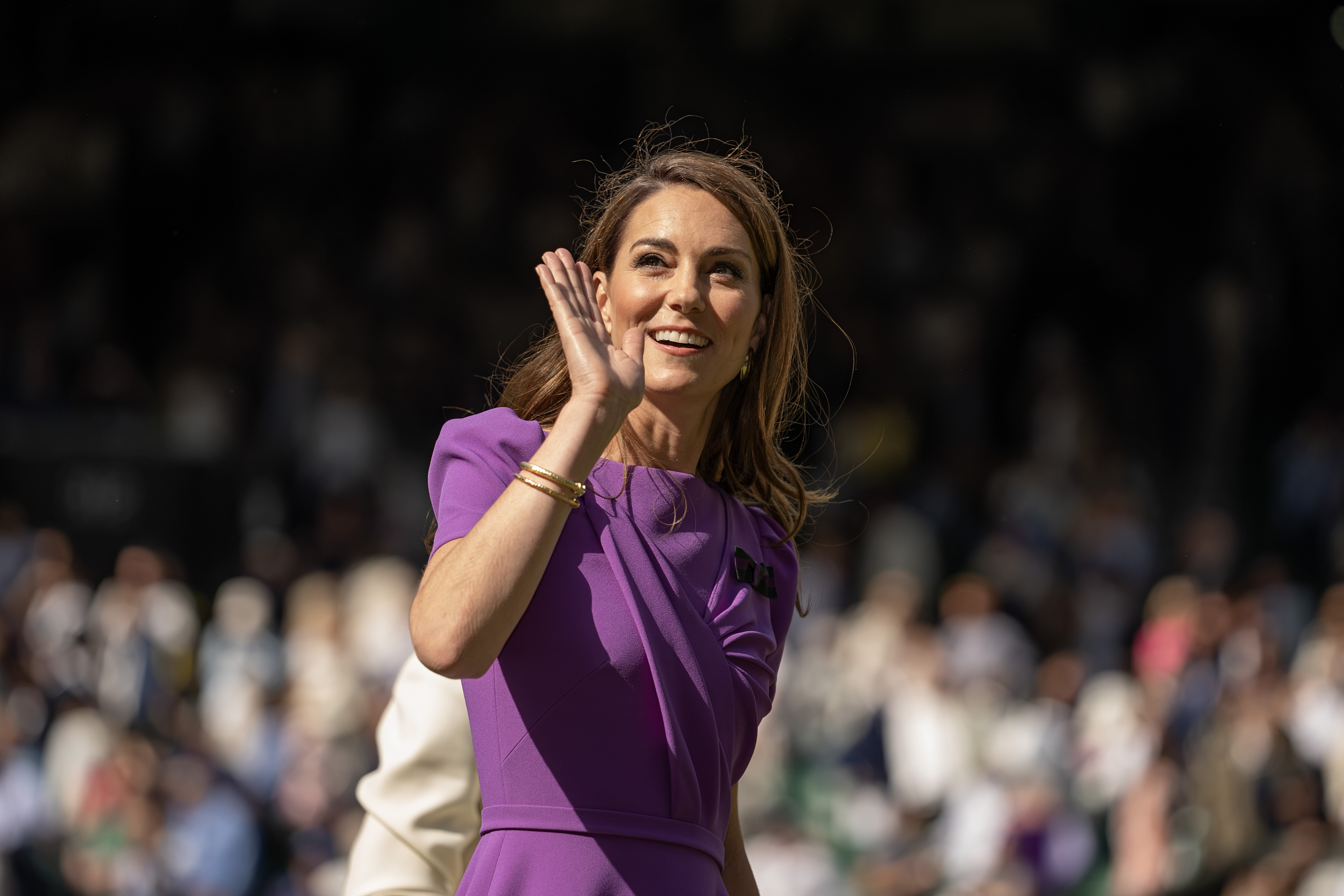 Kate Middleton waves to the crowd during the Wimbledon Tennis Championships on July 14, 2024, in London, England. | Source: Getty Images