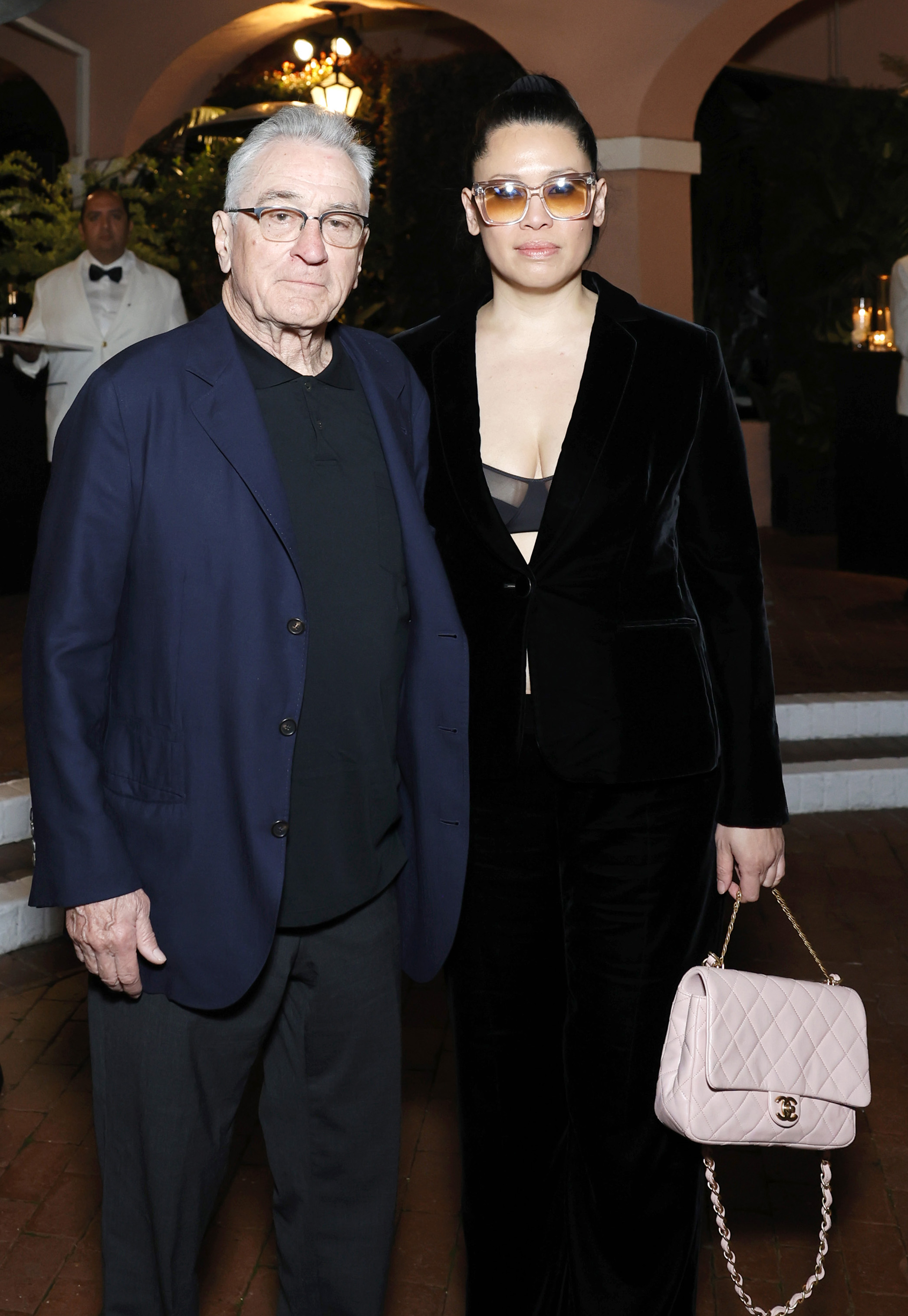 Robert De Niro and Tiffany Chen at the CHANEL and Charles Finch Annual Pre-Oscar Dinner on March 09, 2024 in Beverly Hills, California | Source: Getty Images