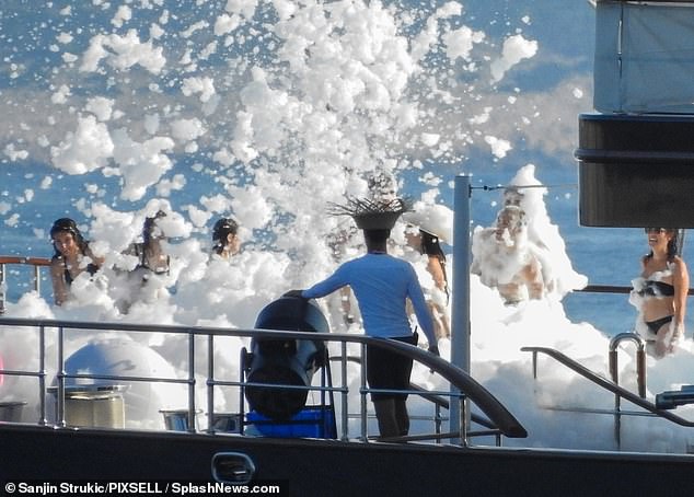 The Amazon founder and his soon-to-be-wife didn't let the backlash get them down, stripping down to their swimsuits for a soapy foam party on Bezos' superyacht Koru on Sunday