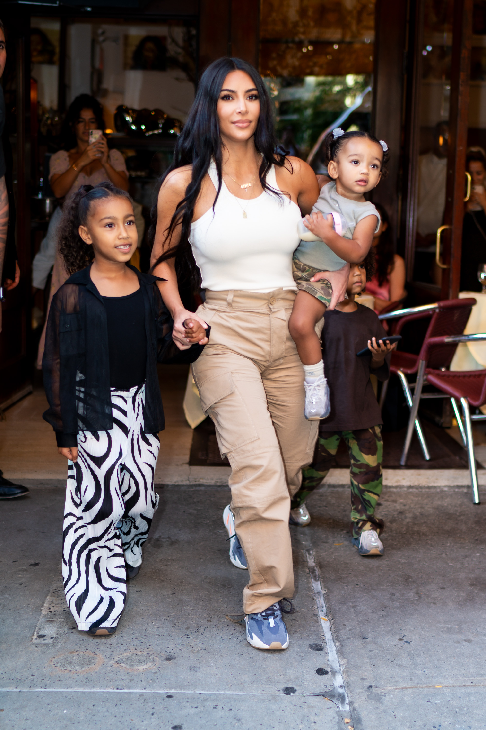 Kim Kardashian with her children North, Saint and Chicago in SoHo on September 29, 2019 in New York City. | Source: Getty Images