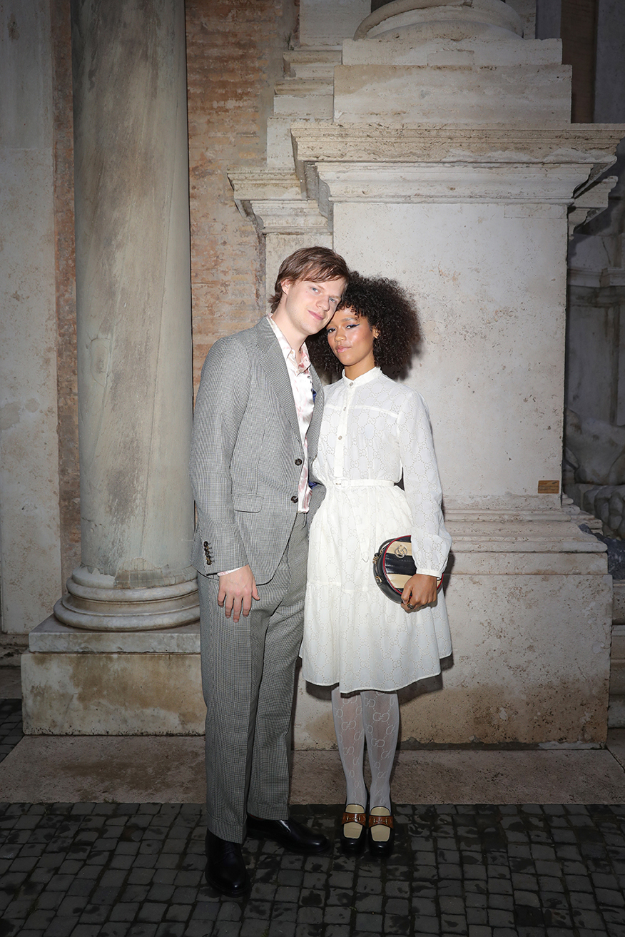 Lucas Hedges and Taylor Russel arrive at the Gucci Cruise 2020 at Musei Capitolini on May 28, 2019 in Rome, Italy | Source: Getty Images