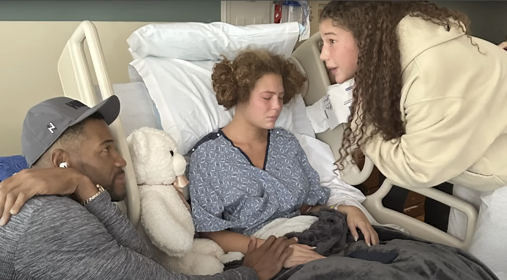 Michael, Isabella, and Sophia Strahan in the hospital, dated October 2023 | Source: YouTube/IsabellaStrahan