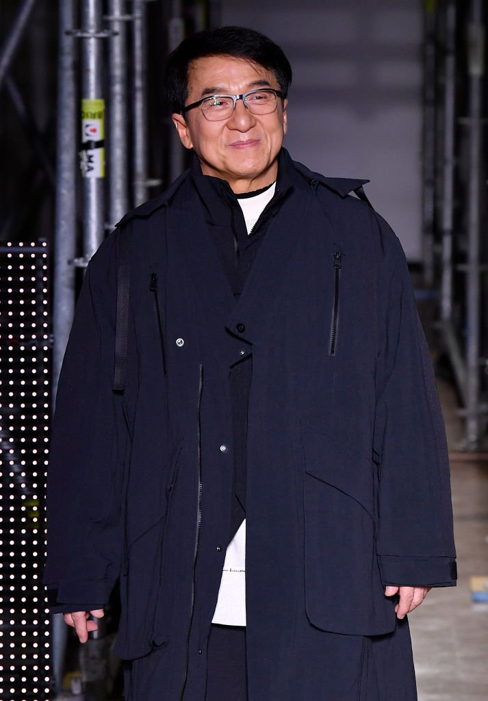 Jackie Chan walks the runway during the Li-Ning Menswear Fall/Winter 2020-2021 show as part of Paris Fashion Week on January 18, 2020 | Source: Getty Images
