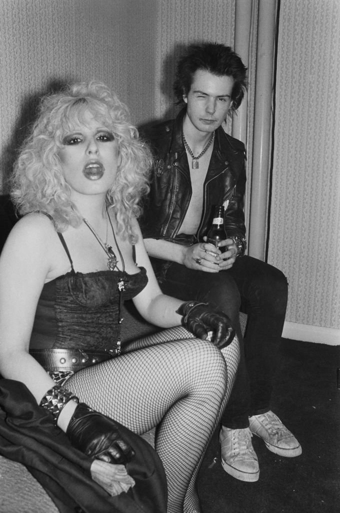 Sid Vicious (1957 - 1979) with girlfriend Nancy Spungen (1958 - 1978) in the backstage of the Electric Ballroom in Camden, London, UK, 15th August 1978. | Photo: Getty Images