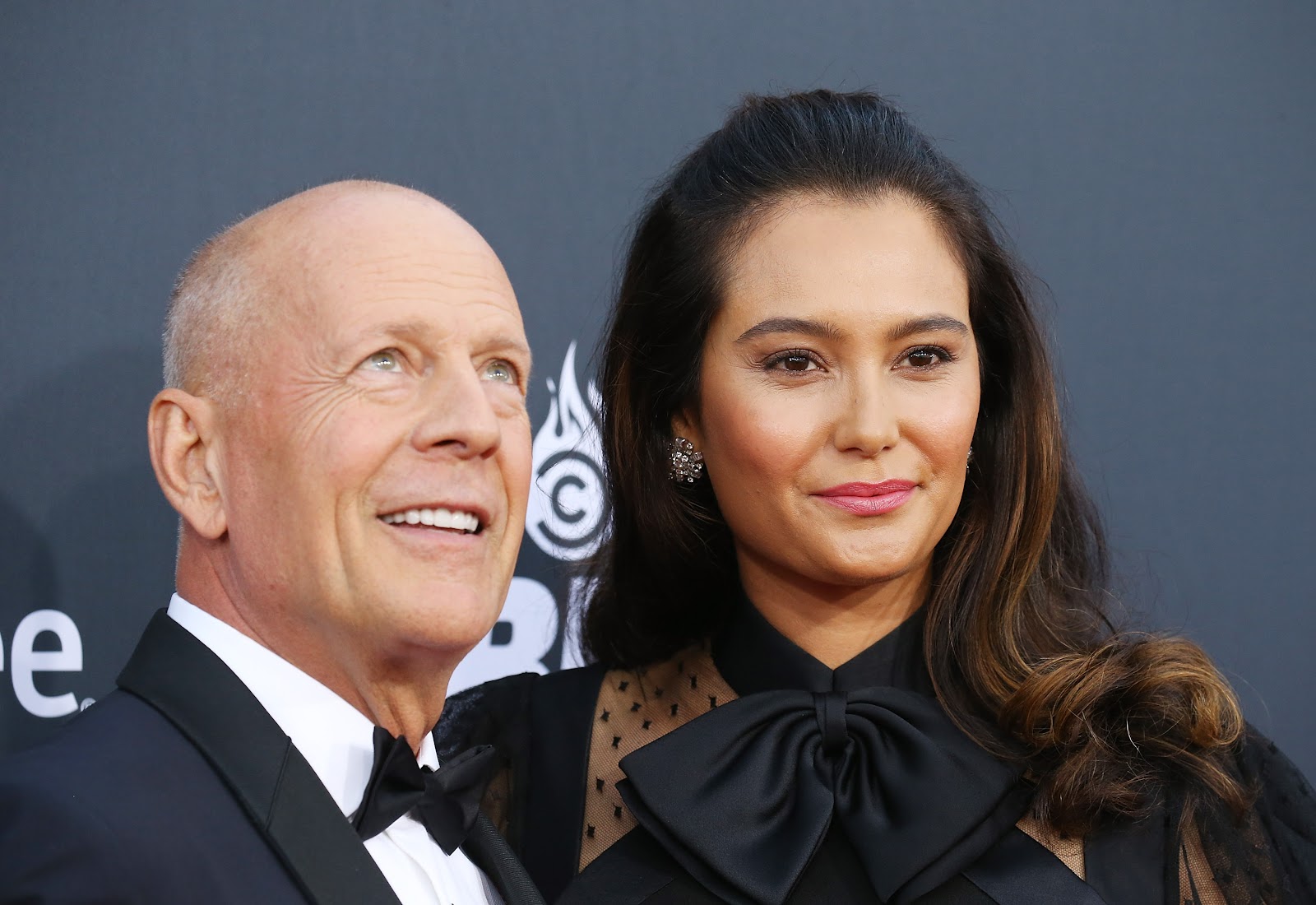 Bruce Willis and Emma Heming arrive at the Comedy Central "Roast of Bruce Willis" in Los Angeles on July 14, 2018 | Source: Getty Images