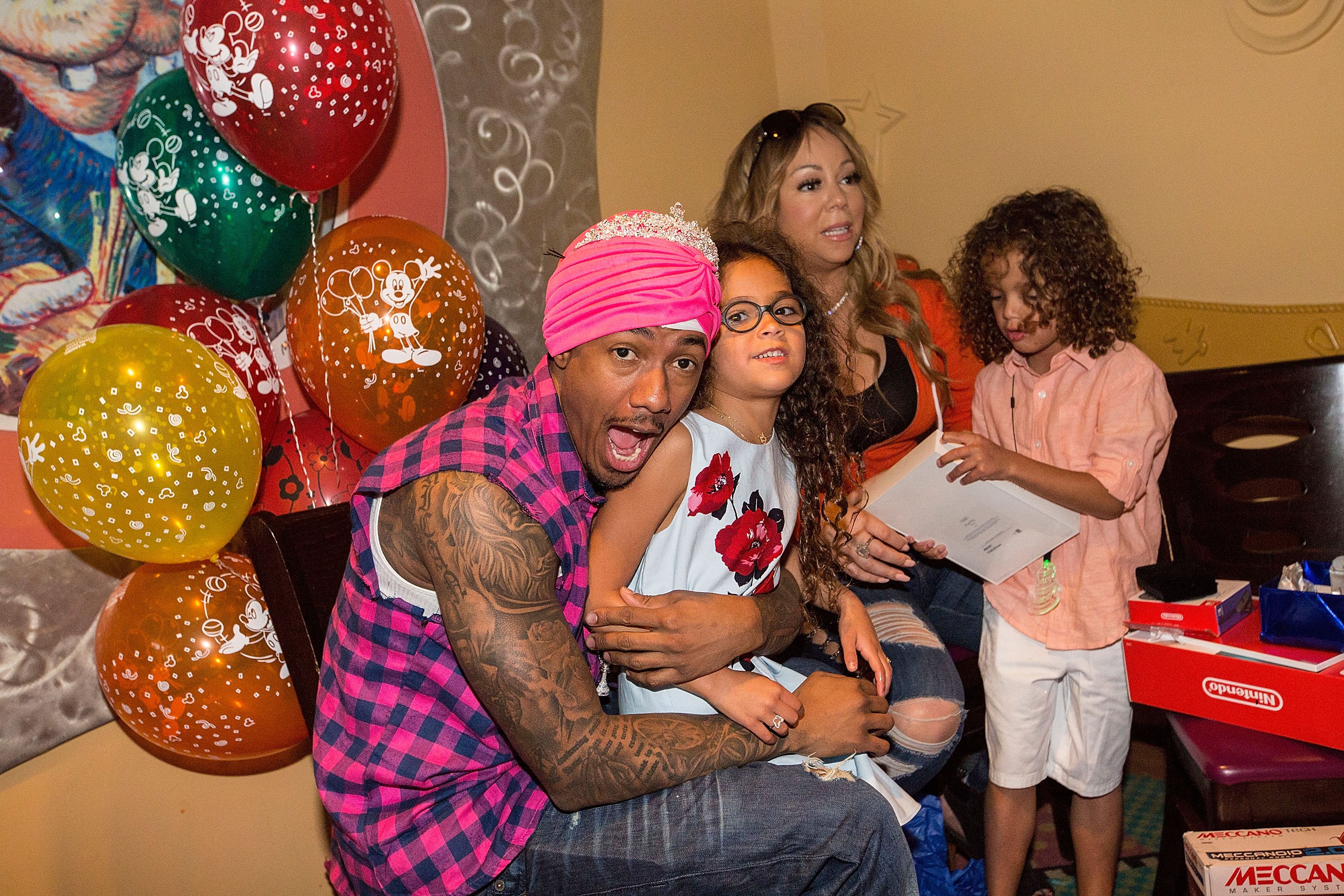 Nick Cannon, Monroe Cannon, Mariah Carey, and Moroccan Cannon celebrate the twins birthday at Disneyland on April 30, 2017 in Anaheim, California. | Source: Getty Images