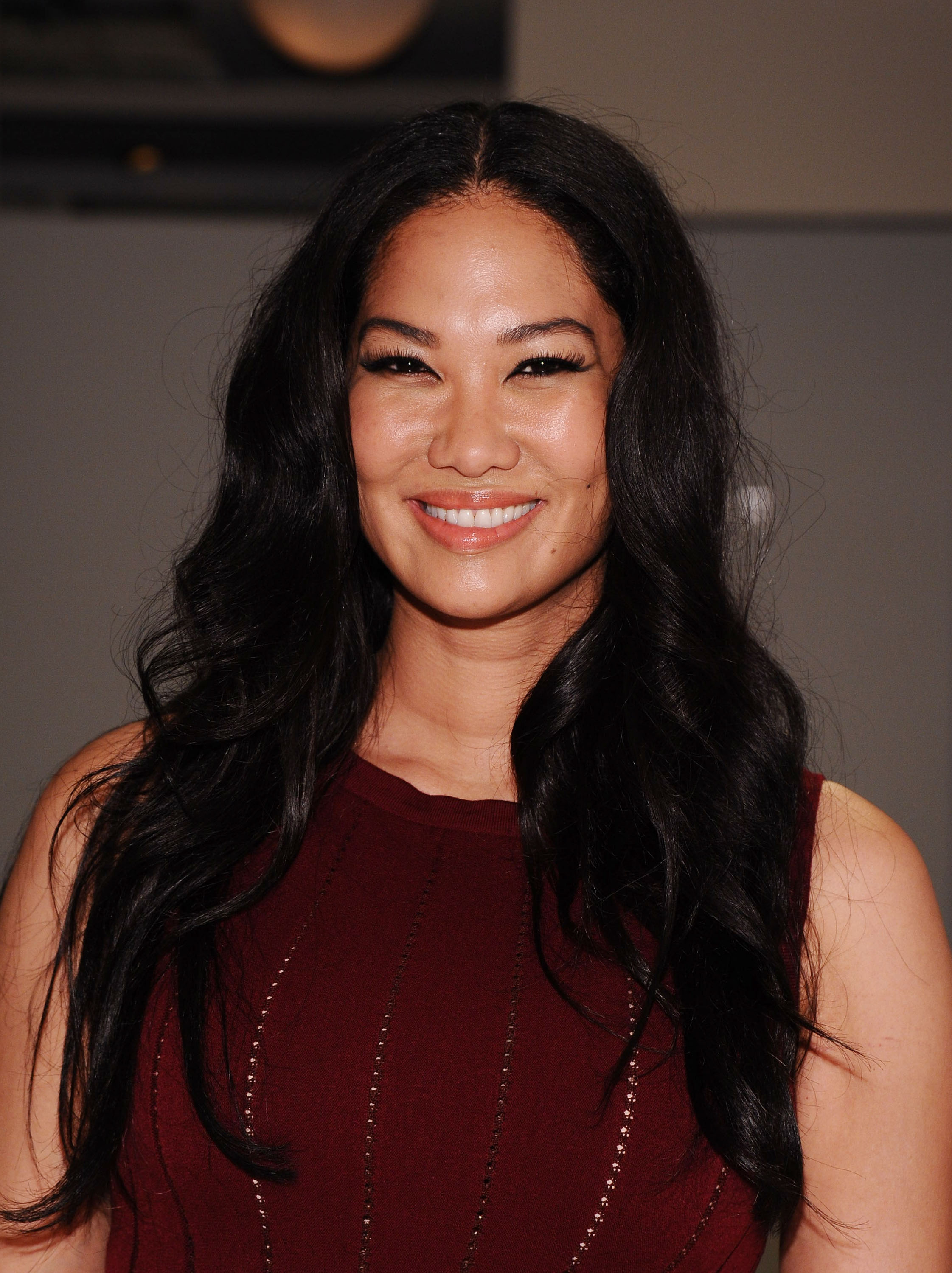 Kimora Lee Simmons poses during Mercedes-Benz Fashion Week Spring 2015 on September 5, 2014 in New York City. | Source: Getty Images