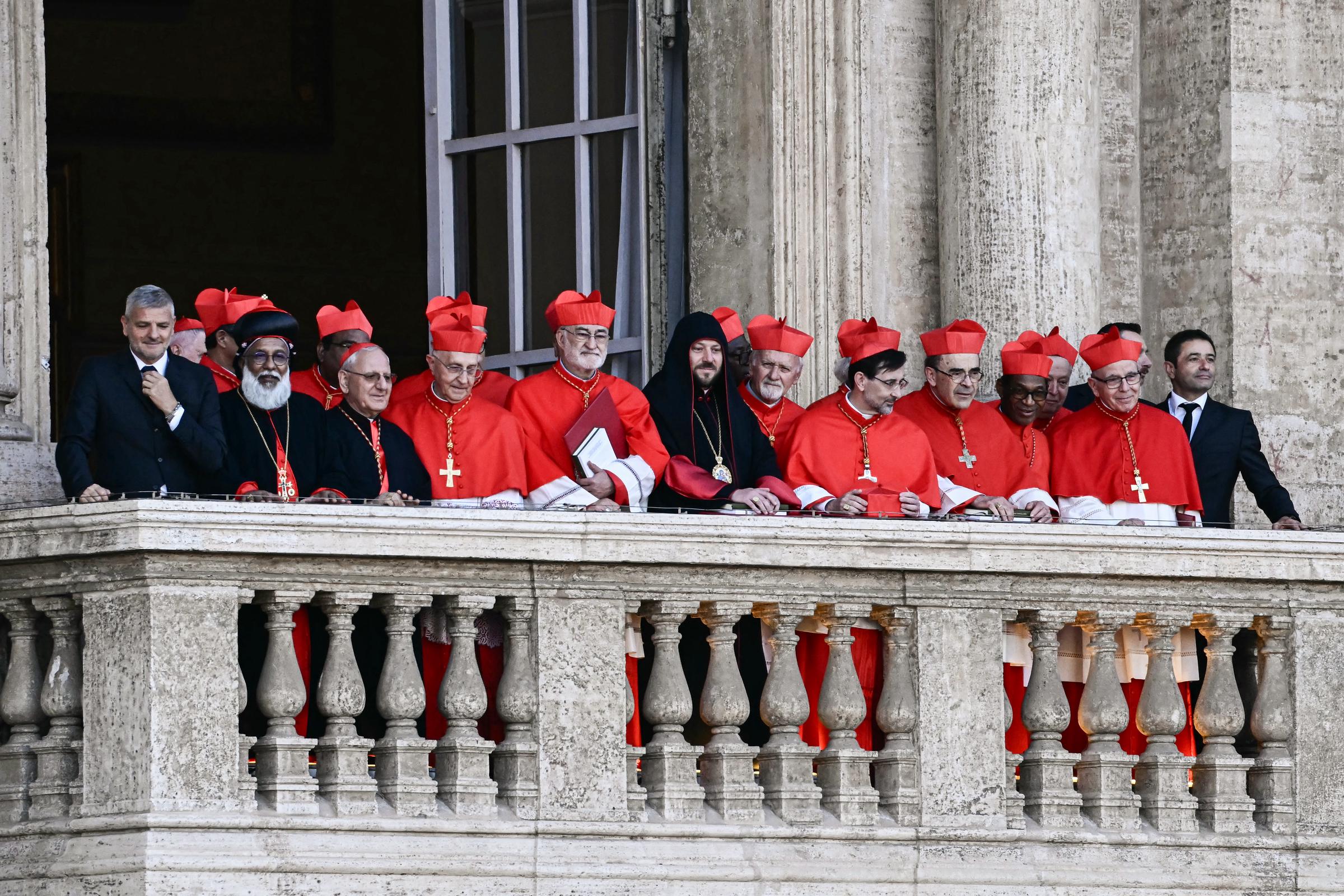 Cardinals at a balcony of the St Peter's Basilica / Source: Getty Images