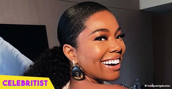 Gabrielle Union flaunts chopped hair in floral maxi dress with black lace panel in new photo