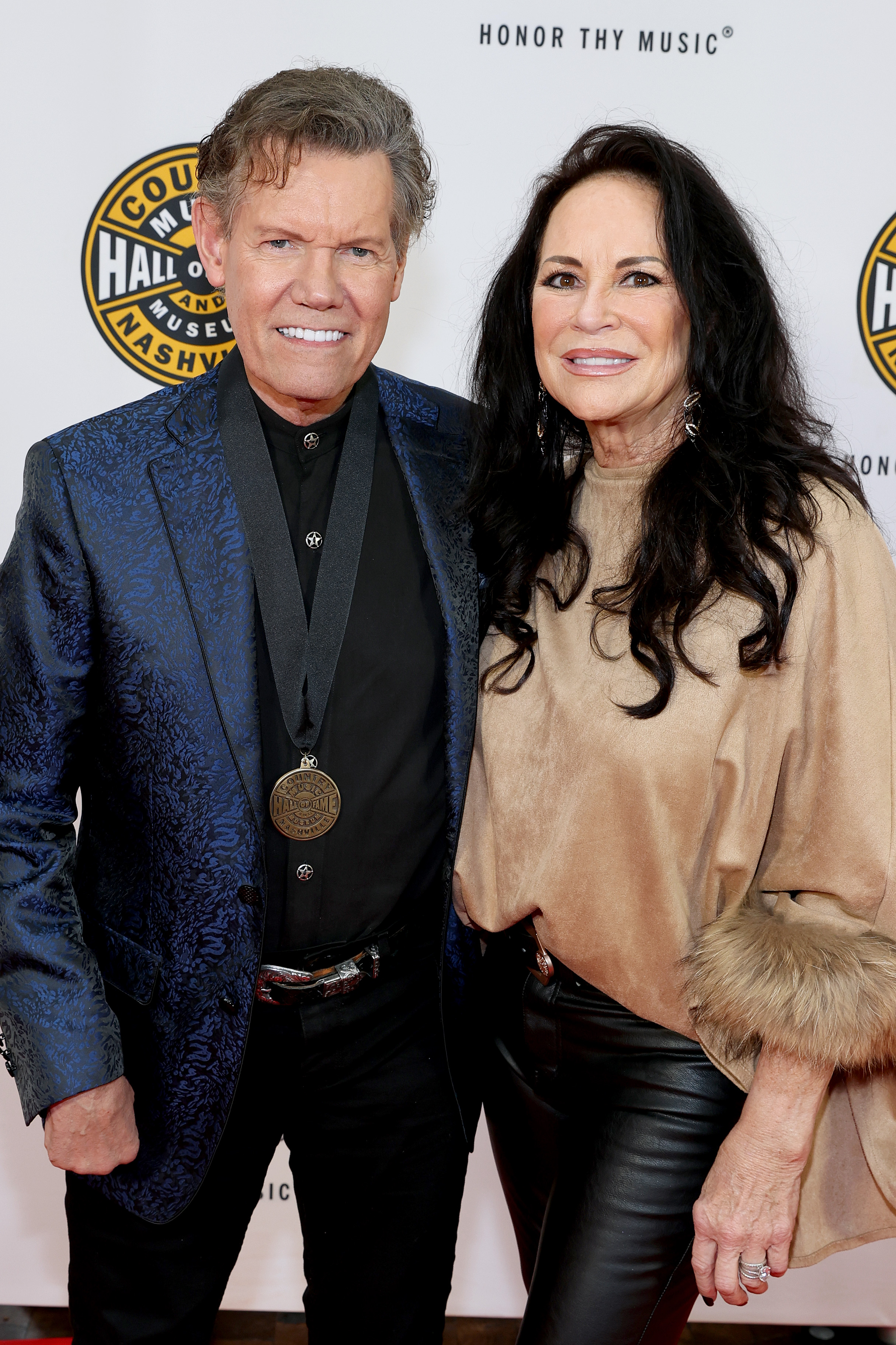 Randy Travis and Mary Davis at Country Music Hall of Fame and Museum on October 16, 2022 in Nashville, Tennessee | Source: Getty Images