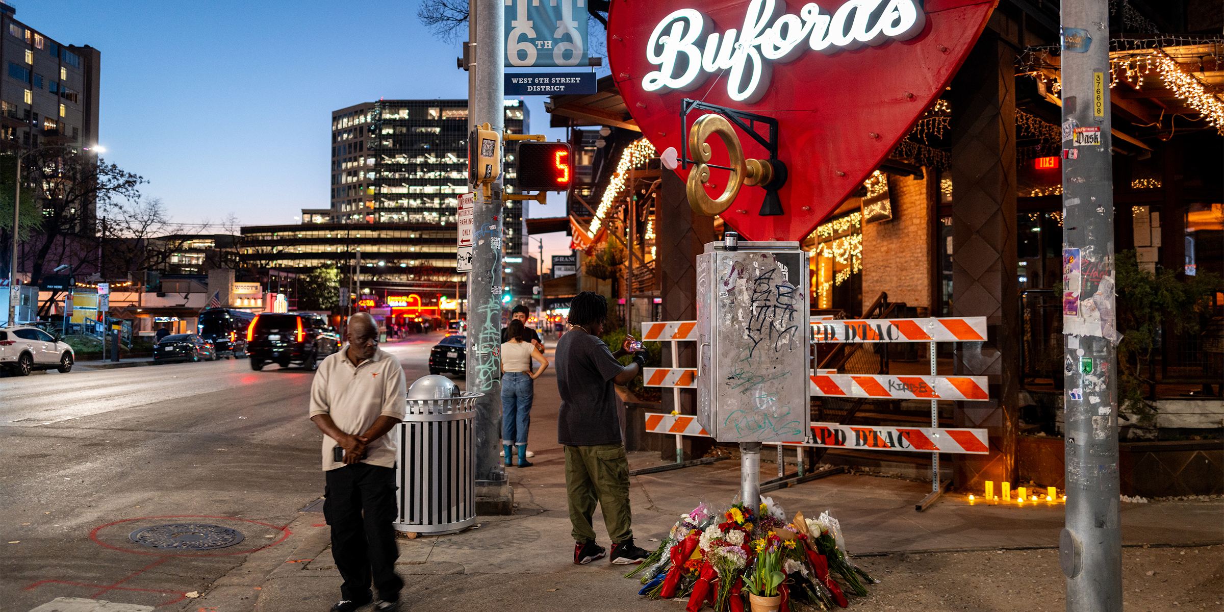 A makeshift memorial outside of Buford's bar | Source: Getty Images