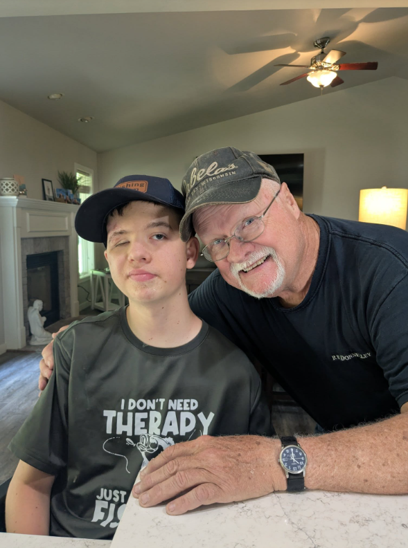 Brett Jedwabny posing with an older man | Source: Facebook/TylerandNicole Jedwabny