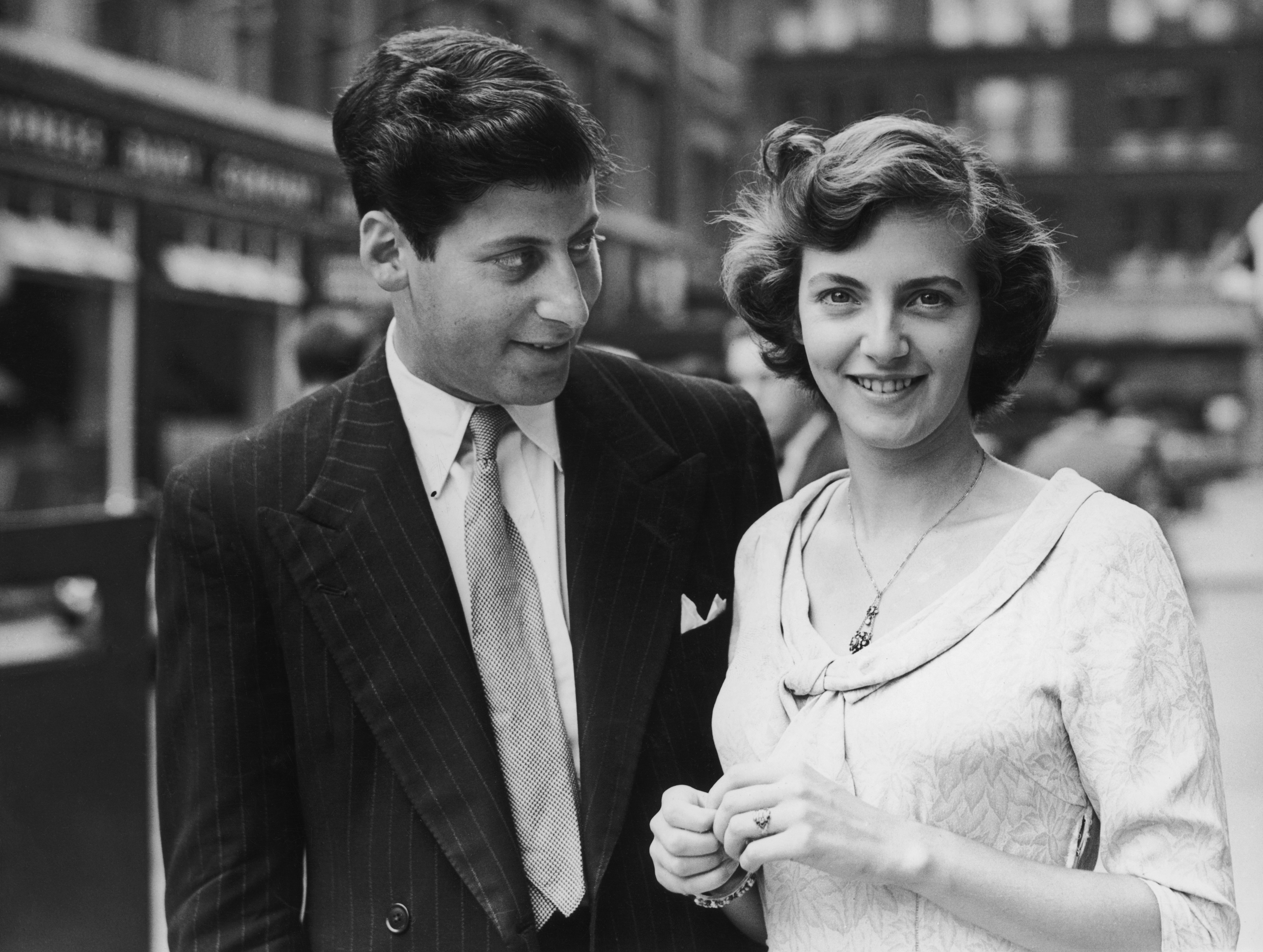 Clement Freud (1924 - 2009) in London with his fiancee, actress June Flewett, shortly after their engagement was announced, on 28 June 1950. | Source: Getty Images