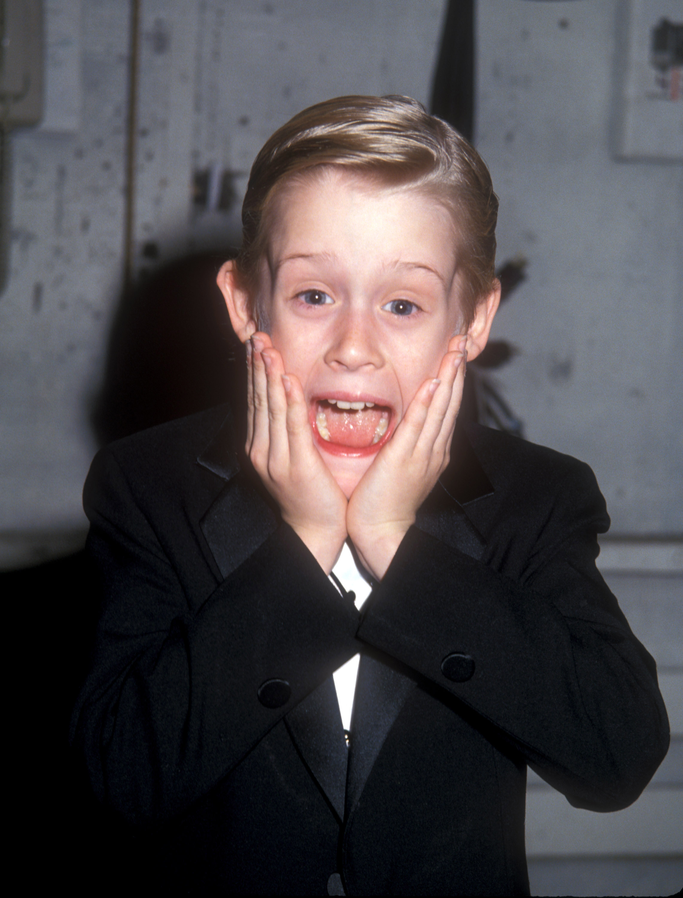 Macaulay Culkin at the American Comedy Awards at the Shrine Auditorium in Los Angeles, California in 1991 | Source: Getty Images