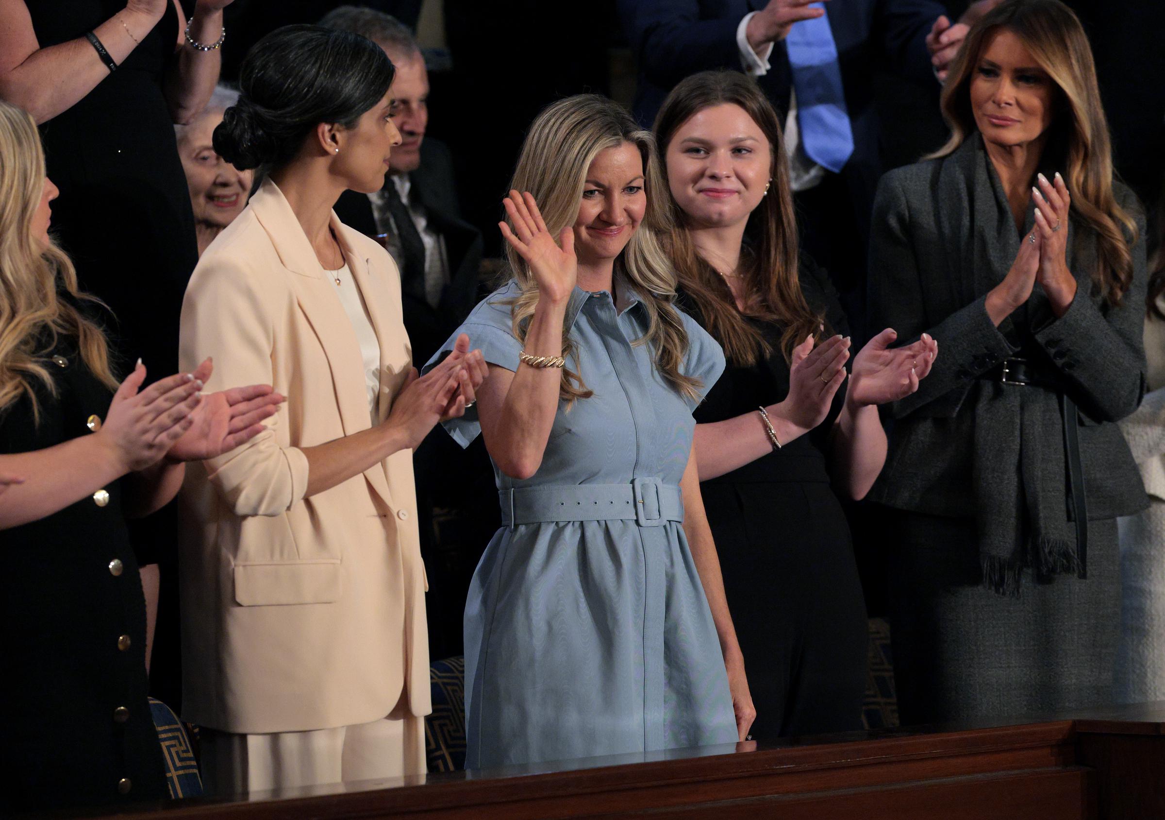 Usha Vance (L) joins Melania Trump (R) during Donald Trump's address to a joint session of Congress | Source: Getty Images