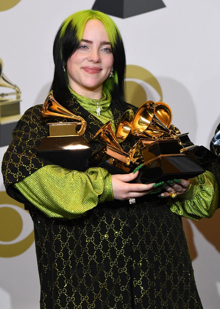 Billie Eilish poses with her awards at the 62nd Annual GRAMMY Awards on January 26, 2020, in Los Angeles | Source Getty Images