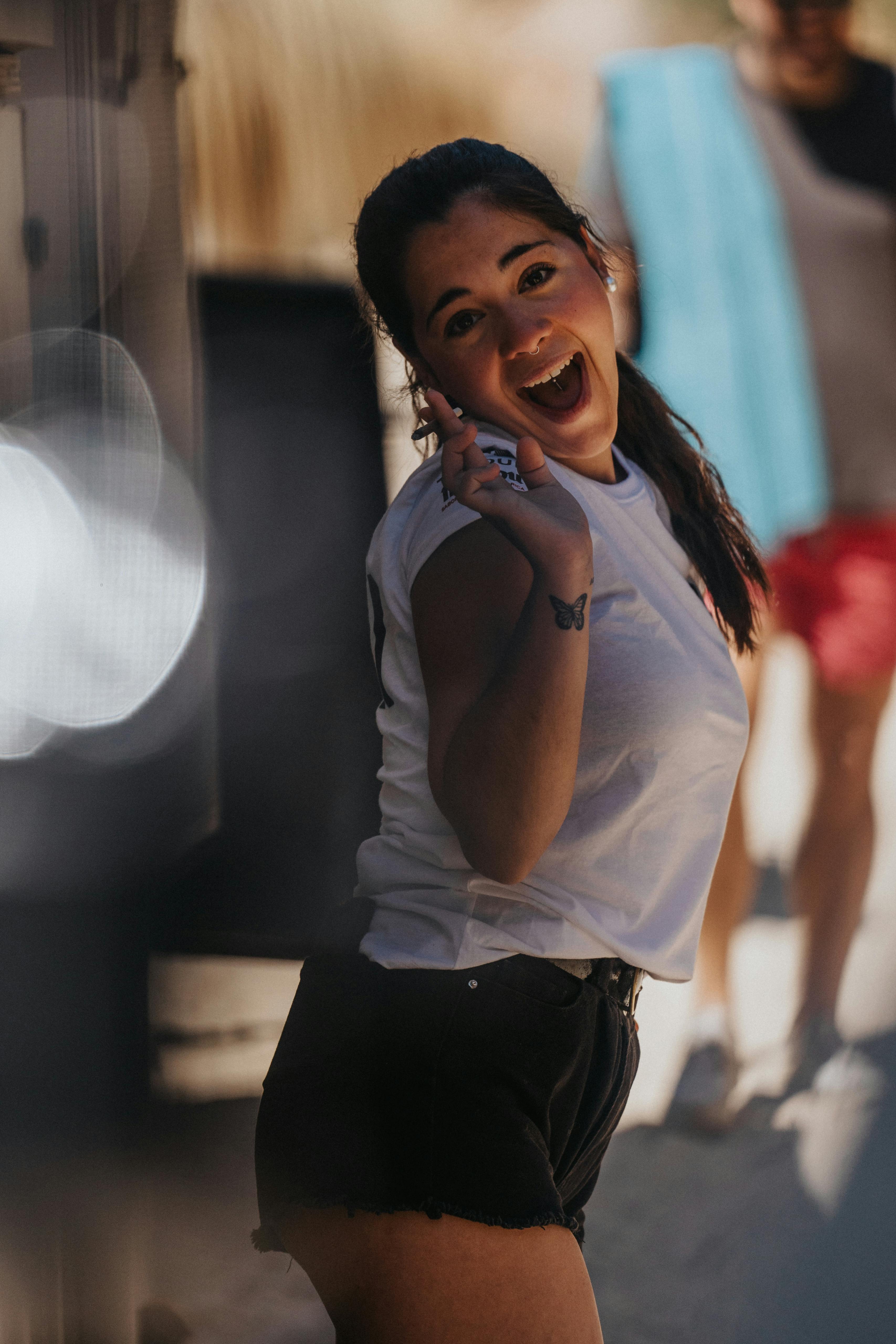 A happy woman in the streets | Source: Pexels