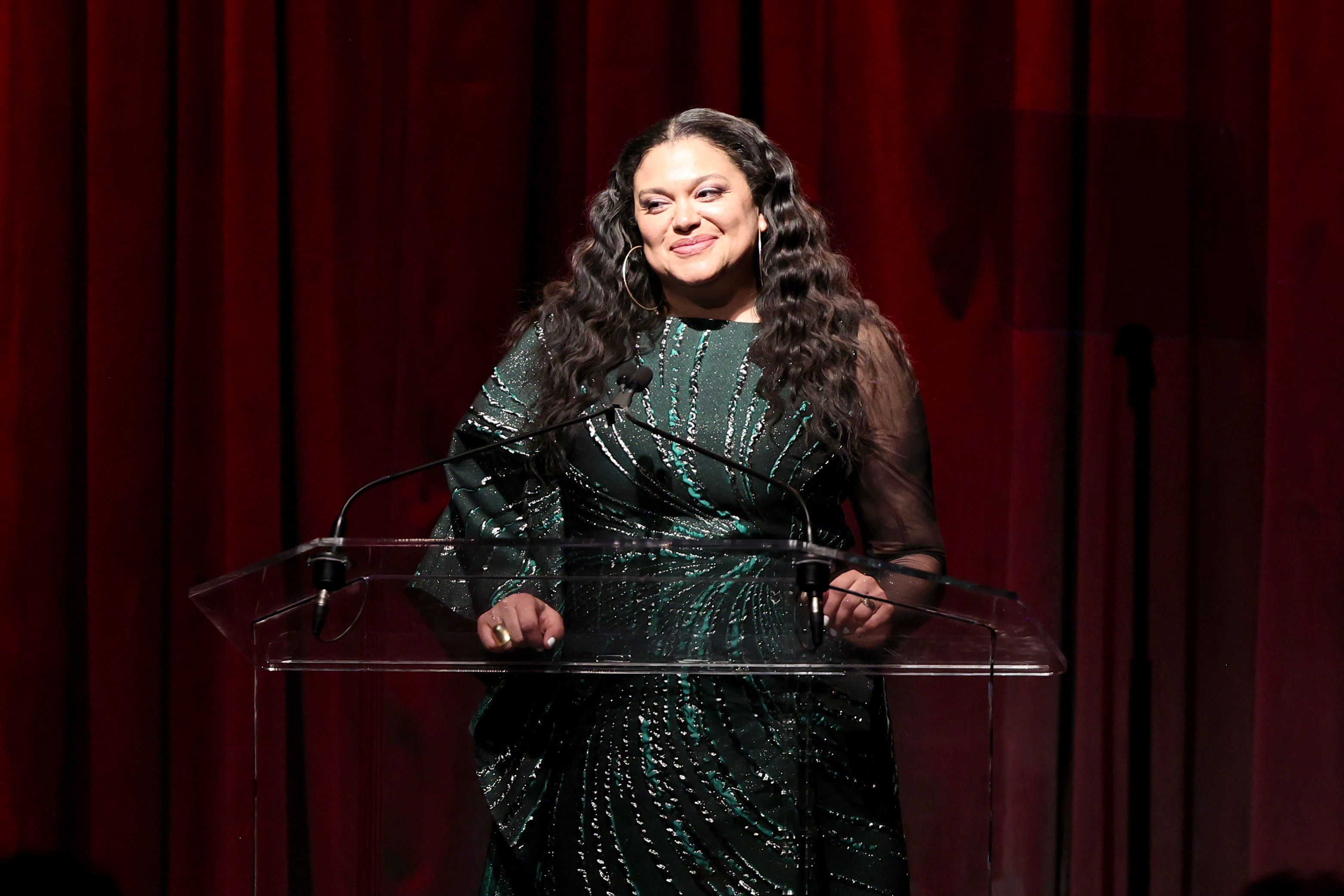 Michelle Buteau is pictured as she speaks onstage during the 75th Annual Writers Guild Awards at The Edison Ballroom on March 5, 2023, in New York City | Source: Getty Images