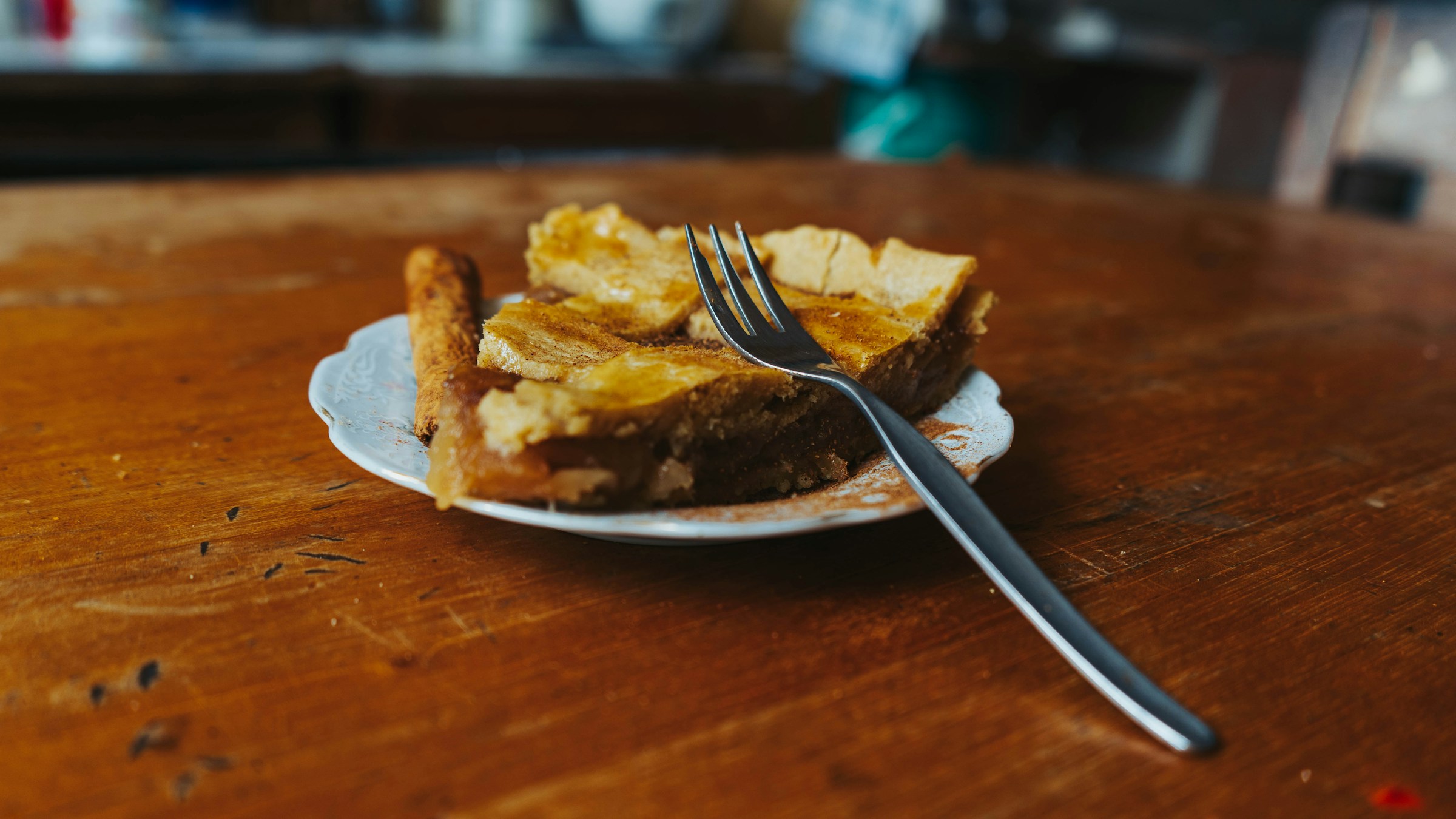 A slice of pie on a plate | Source: Unsplash