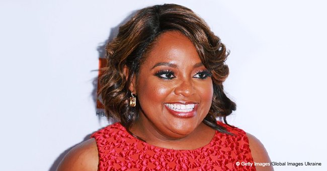 Sherri Shepherd is pretty in yellow as she proudly celebrates son Jeffrey in a heartwarming vid