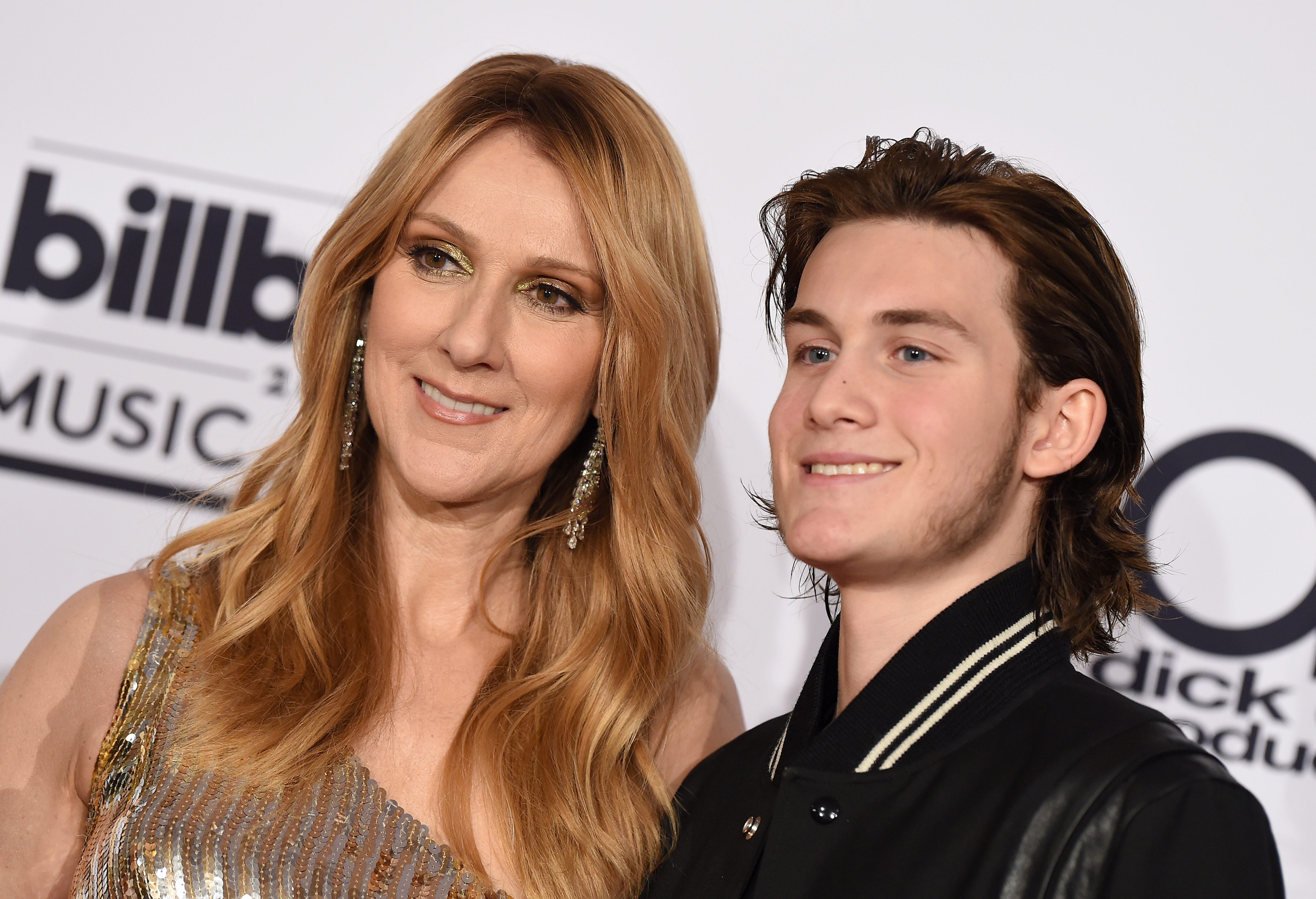 Singer Celine Dion and son Rene Charles Angelil pose in the press room at the 2016 Billboard Music Awards at T-Mobile Arena on May 22, 2016 in Las Vegas, Nevada | Source: Getty Images