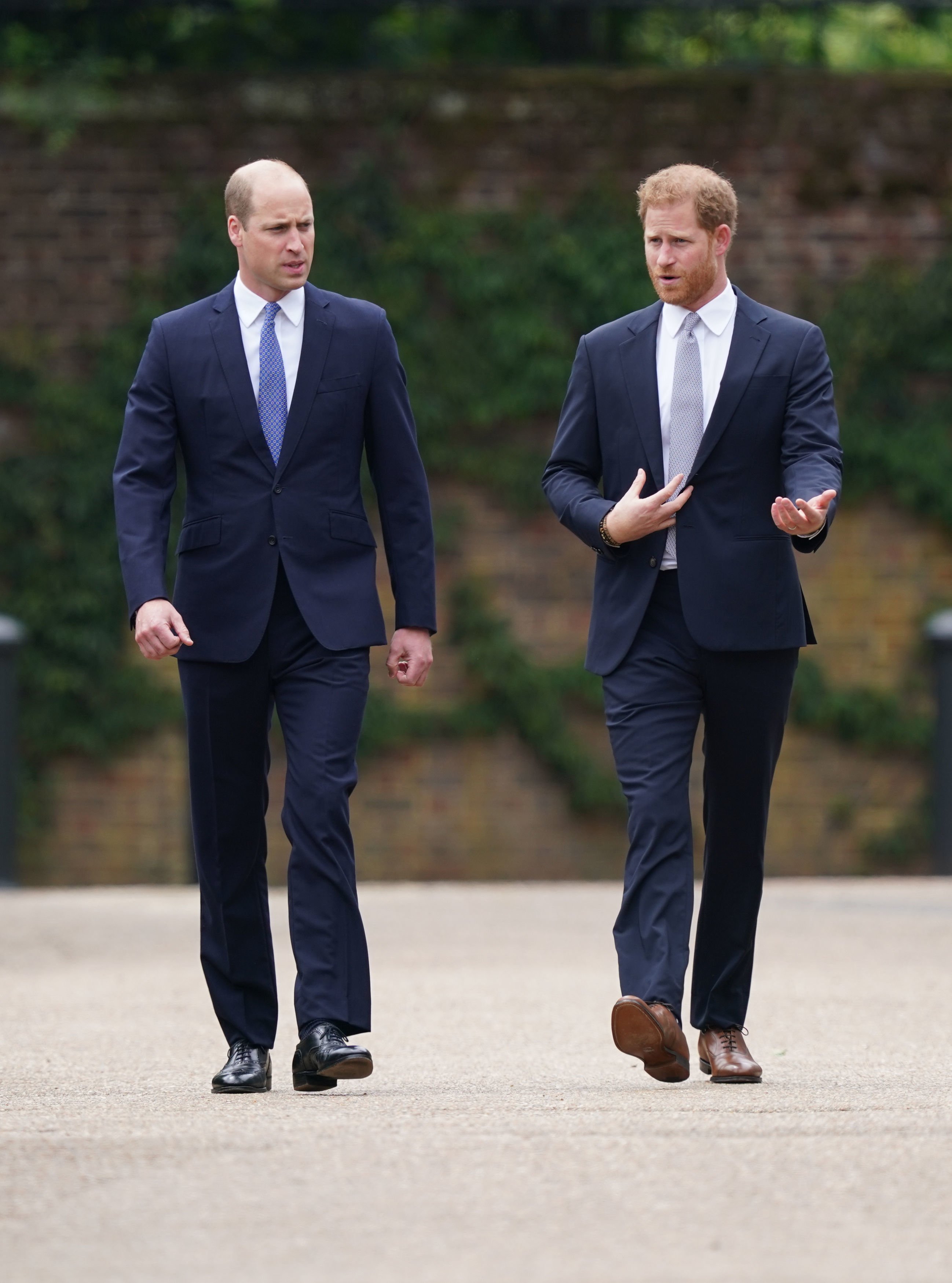 Prince William, Duke of Cambridge (left) and Prince Harry, Duke of Sussex arrive for the unveiling of a statue they commissioned of their mother Diana, Princess of Wales, in the Sunken Garden at Kensington Palace, on what would have been her 60th birthday on July 1, 2021 in London, England. | Source: Getty Images