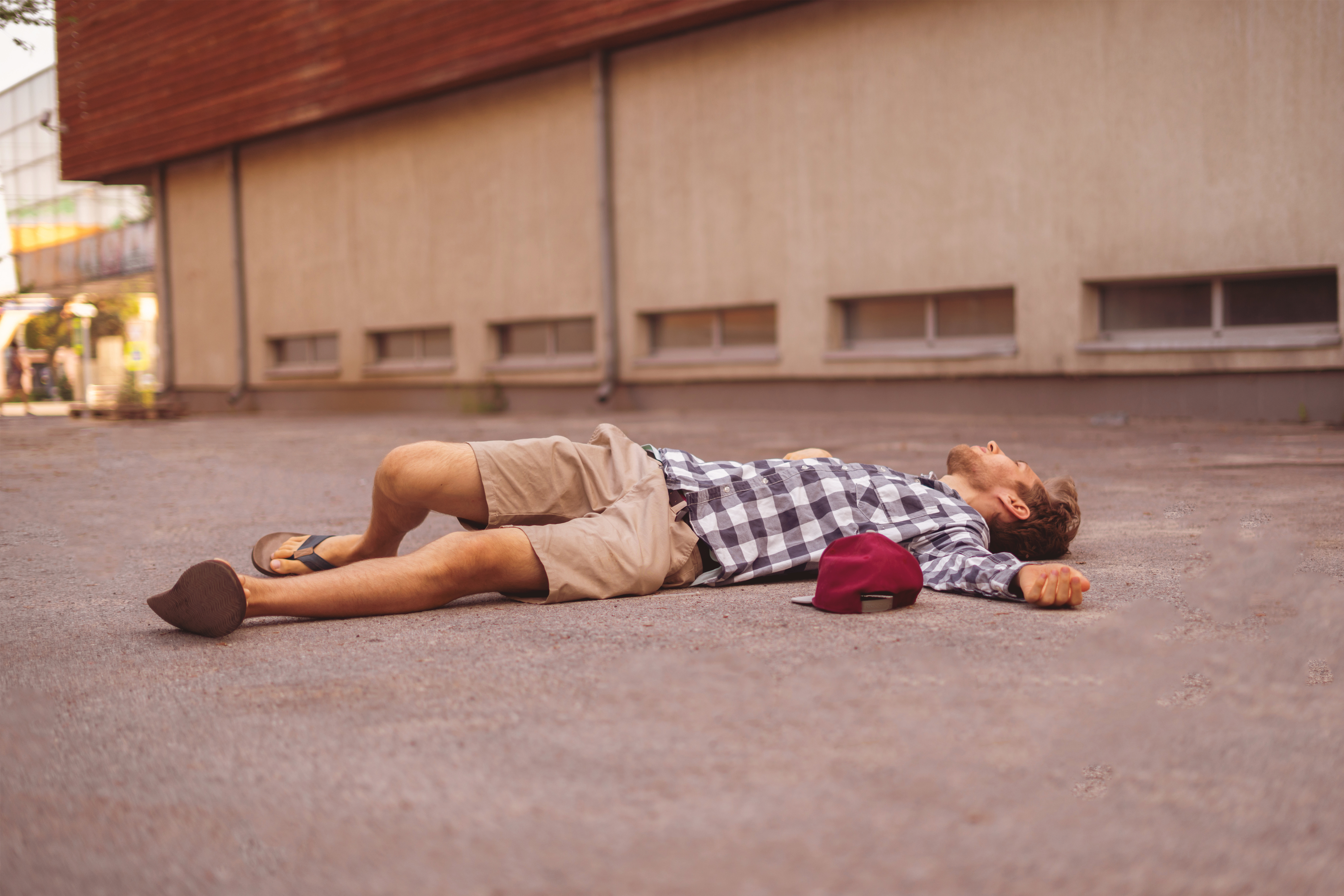 Man on the ground | Source: Shutterstock.com