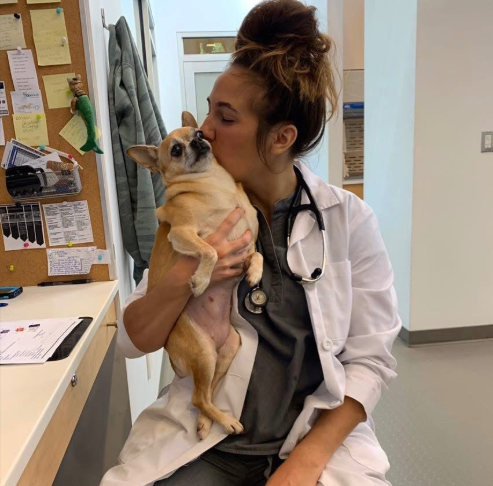 Lauren Semanchik hugging a furry animal, from a post dated August 4, 2025 | Source: GoFundMe