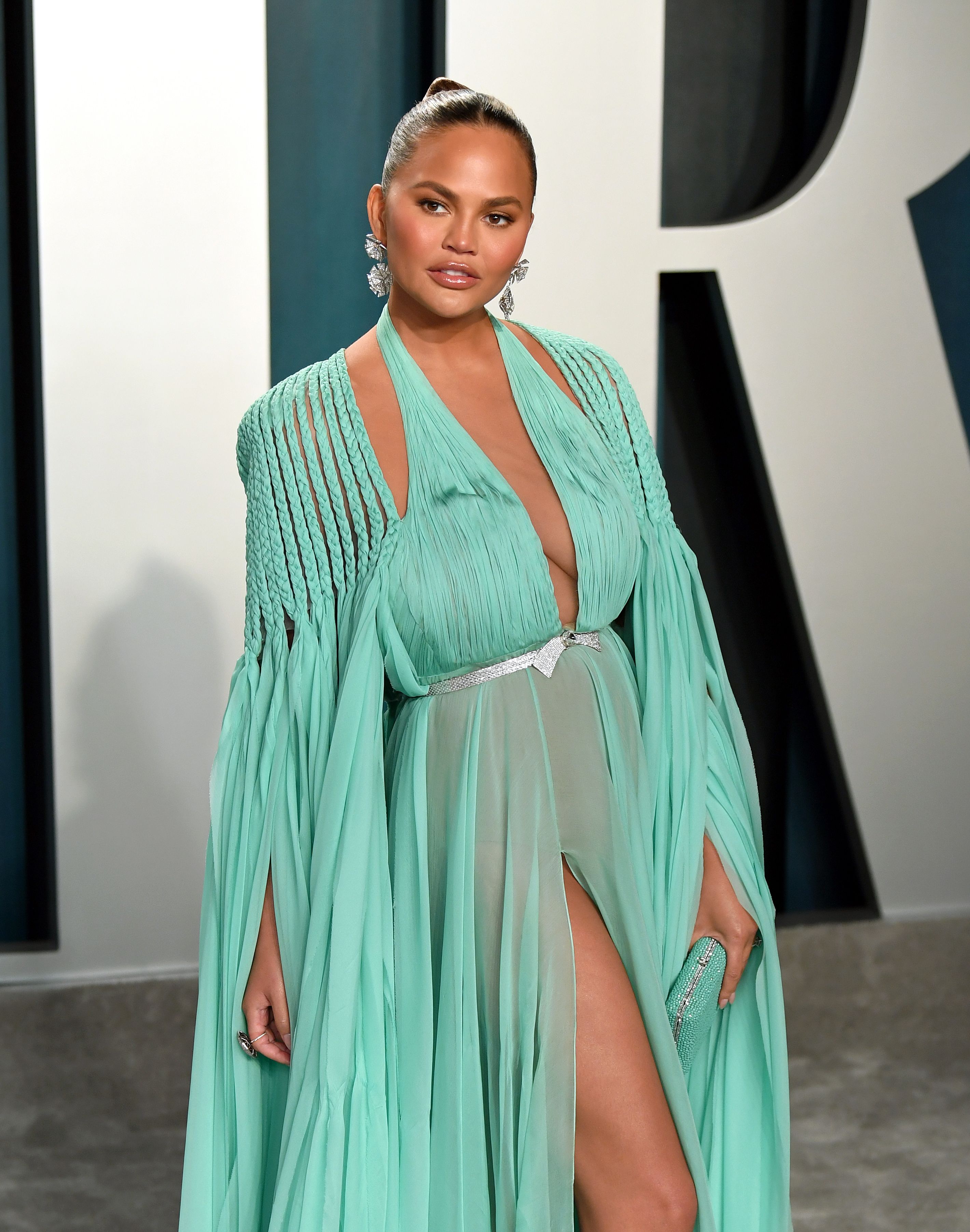 Chrissy Teigen attends the 2020 Vanity Fair Oscar Party hosted by Radhika Jones at Wallis Annenberg Center for the Performing Arts on February 09, 2020 in Beverly Hills, California. | Source: Getty Images