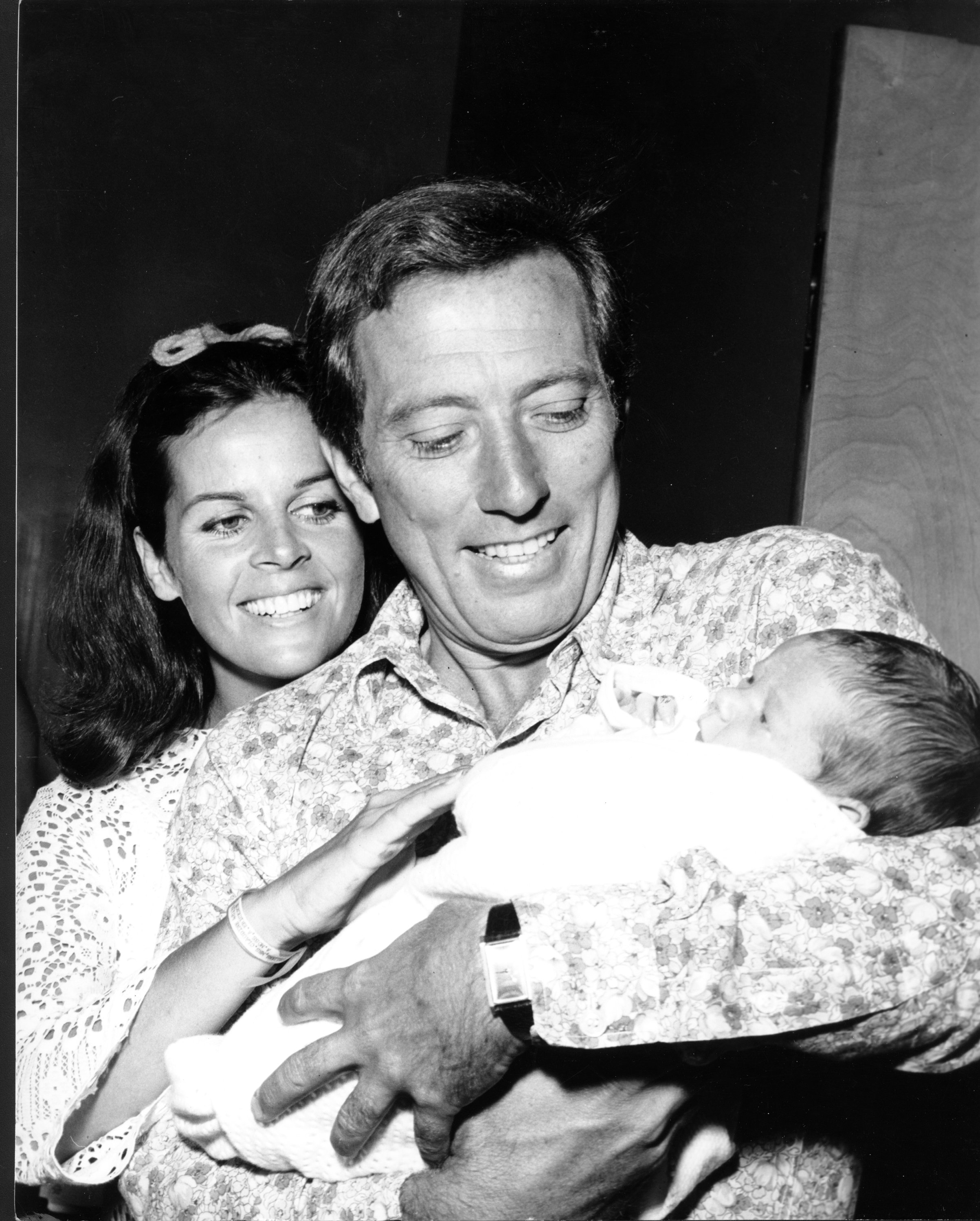 Andy Williams and wife Claudine Longet pose with their newborn baby Robert Williams on August 5, 1969 in Los Angeles, California | Source: Getty Images 