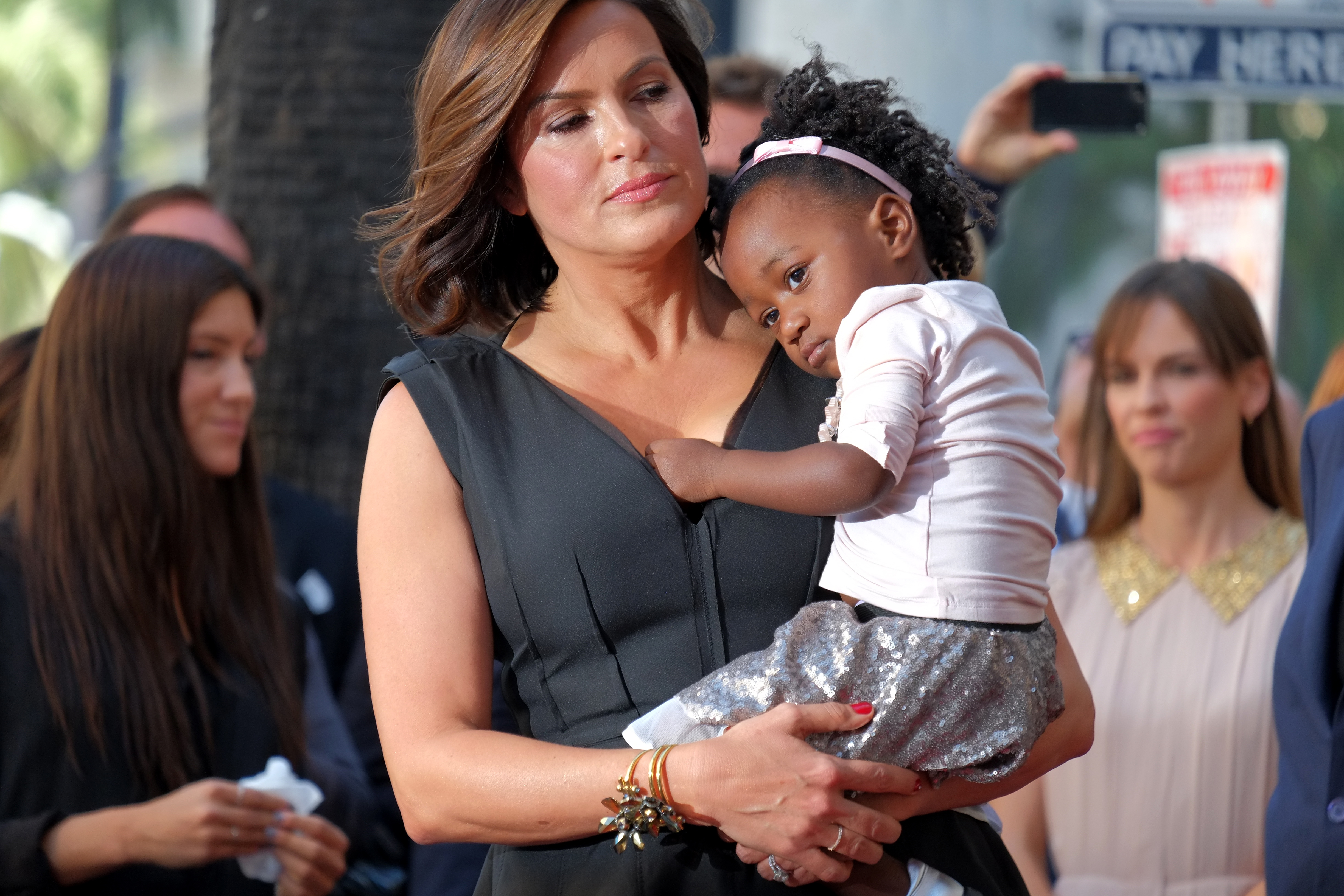 Mariska Hargitay and her daughter, Amaya, share a special moment at the Hollywood Walk of Fame ceremony on November 8, 2013 as the actress was honored with a star in Hollywood, California | Source: Getty Images