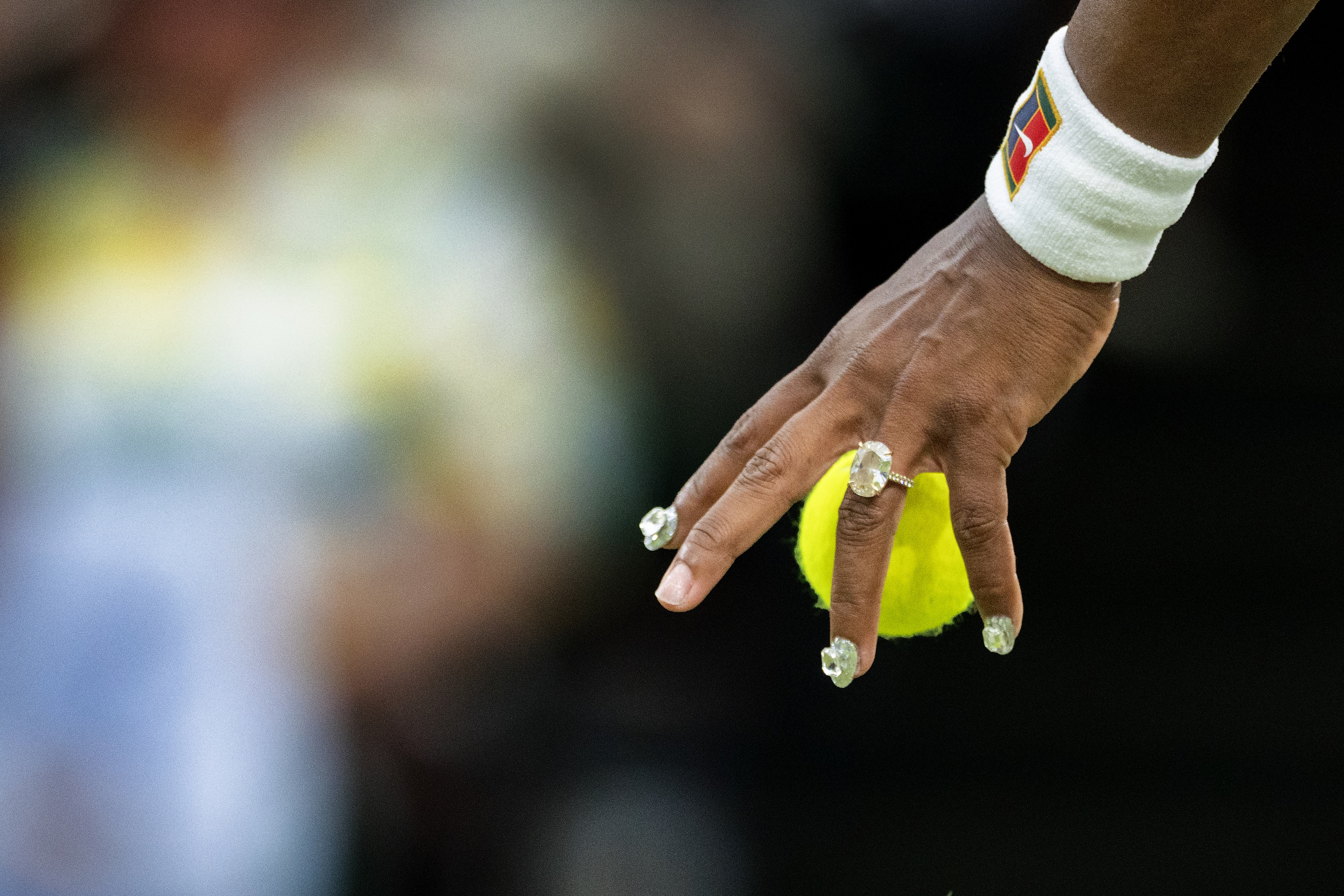 Netizens widely criticized the look of Serena Williams' hands, one of which displayed a unique manicure alongside her expensive diamond engagement ring. | Source: Getty Images