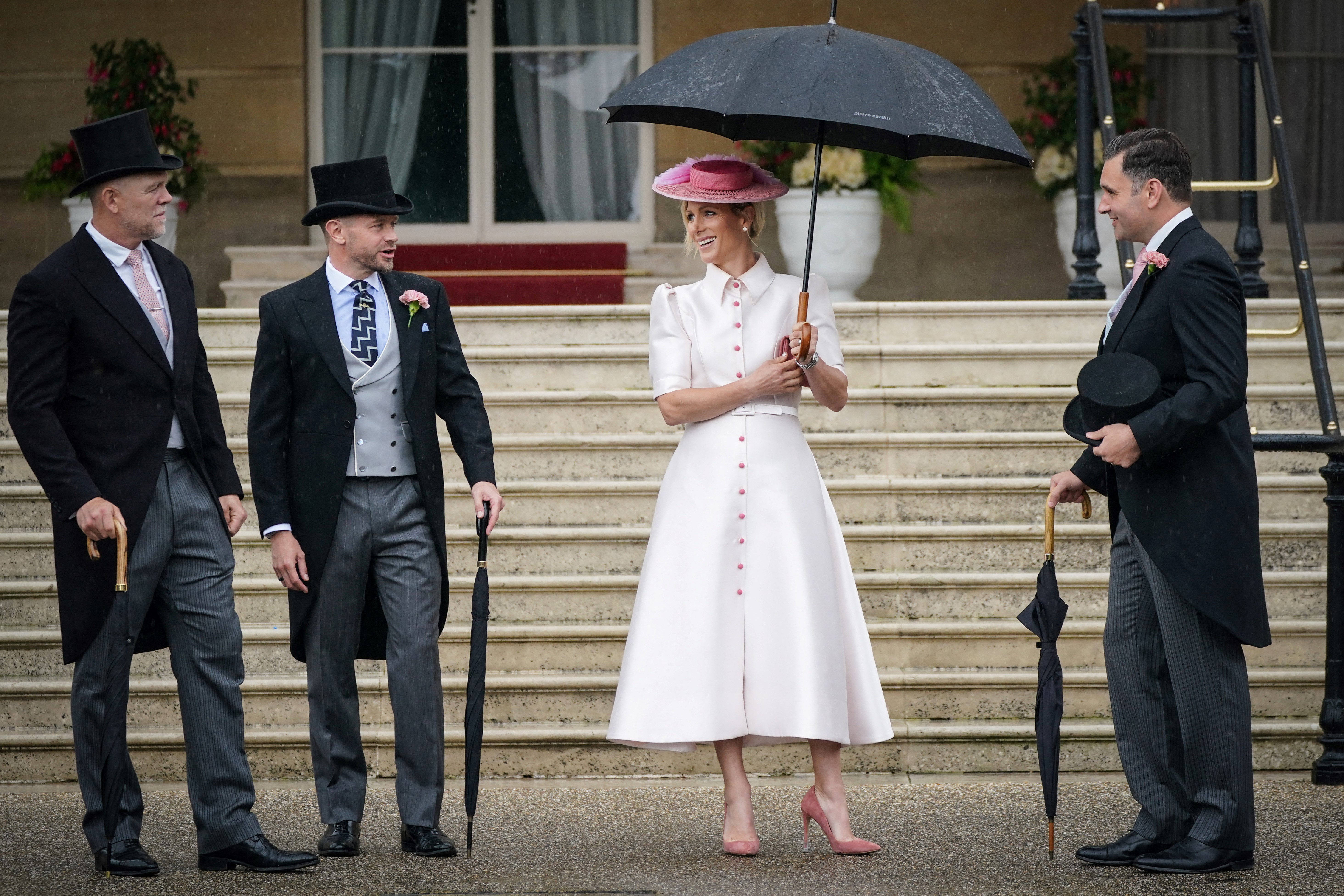 Zara Tindall and her husband Mike Tindall (left) arrive at the Sovereign's Garden Party at Buckingham Palace on May 21, 2024 in London, England. | Source: Getty Images