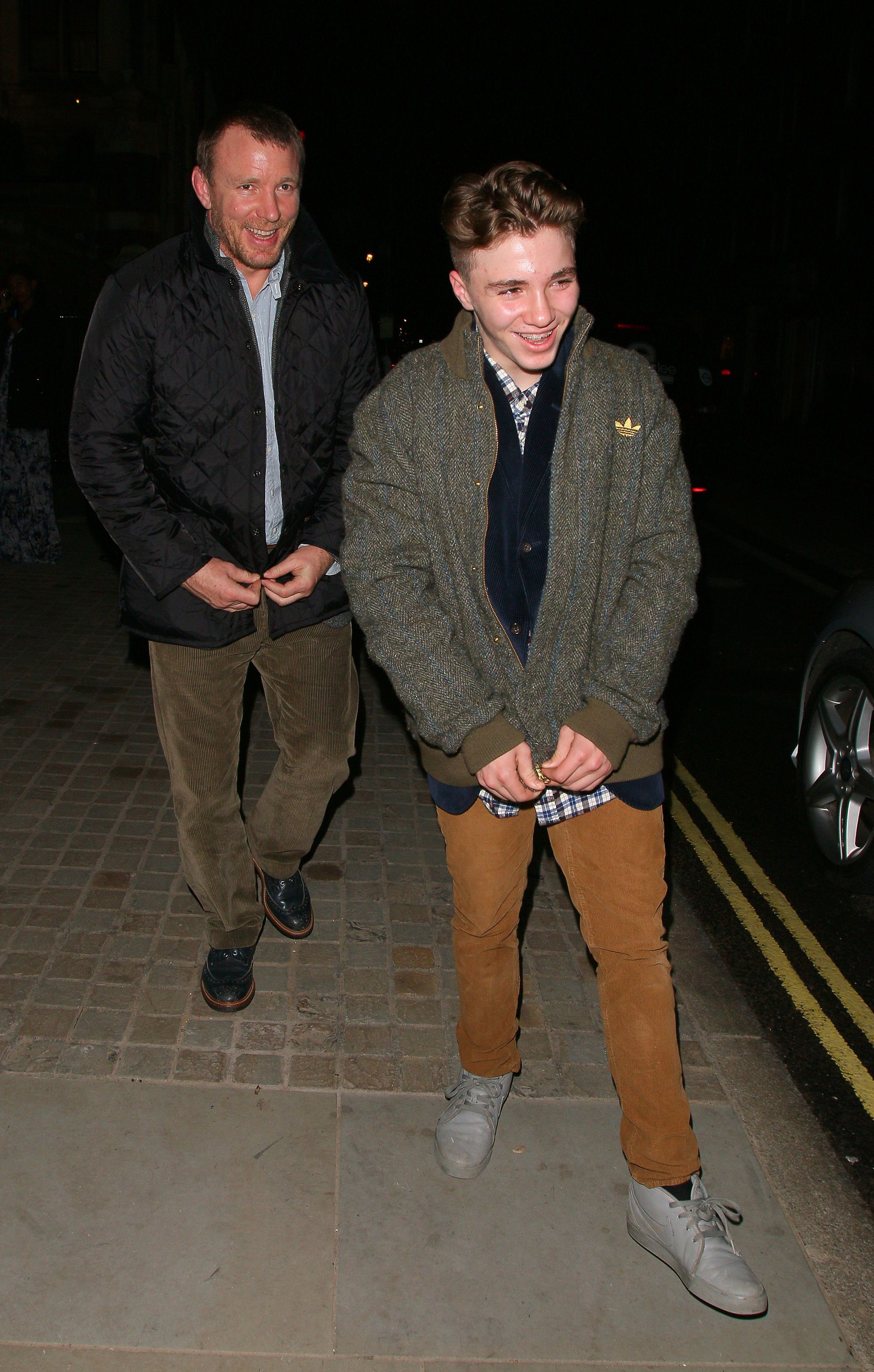 Guy Ritchie and Rocco Ritchie during London Fashion Week in February 2014 in London, England | Source: Getty Images