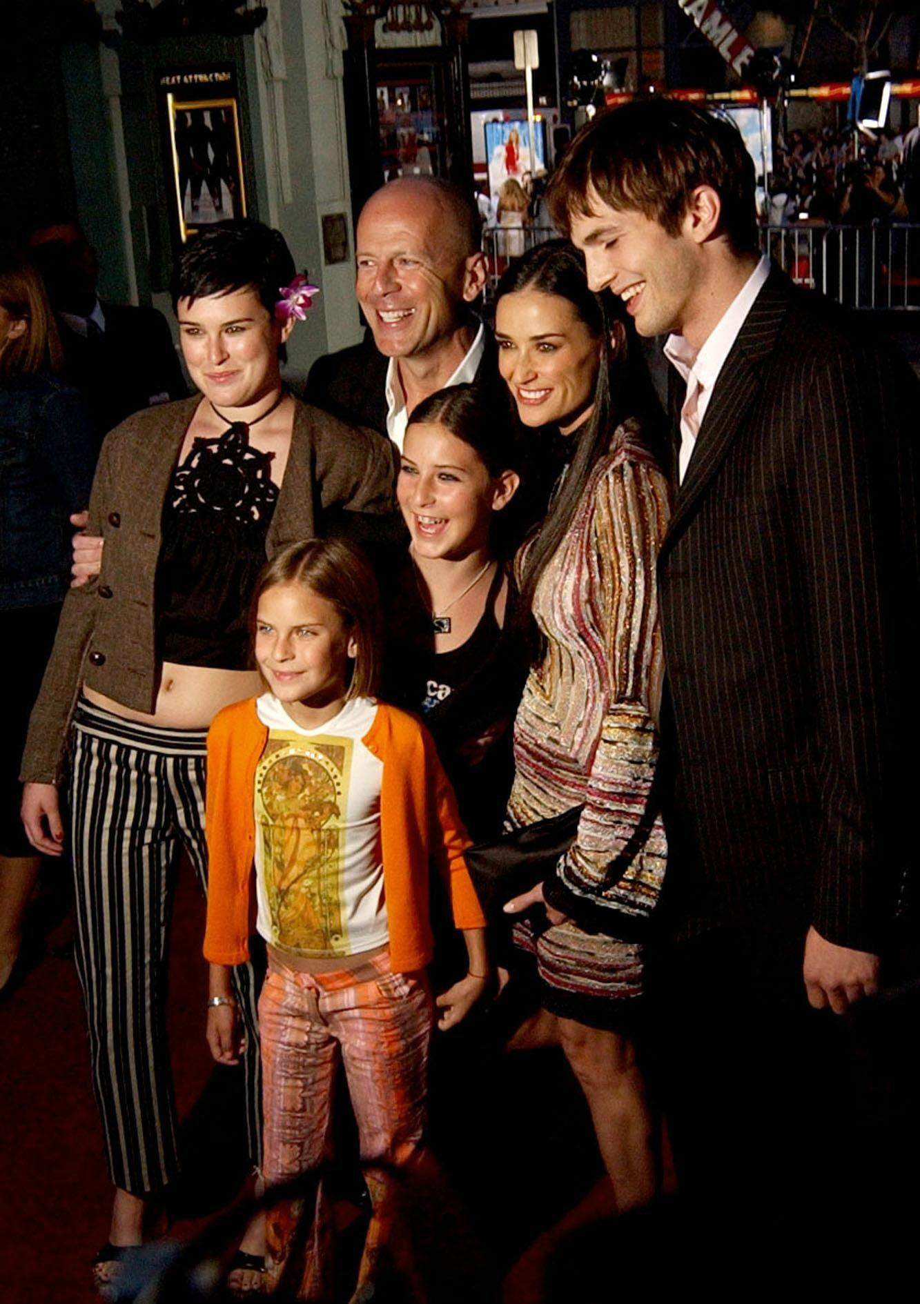 Demi Moore, Bruce, Rumer, Scout, and Tallulah Willis with Ashton Kutcher on June 18, 2003. | Source: Getty Images