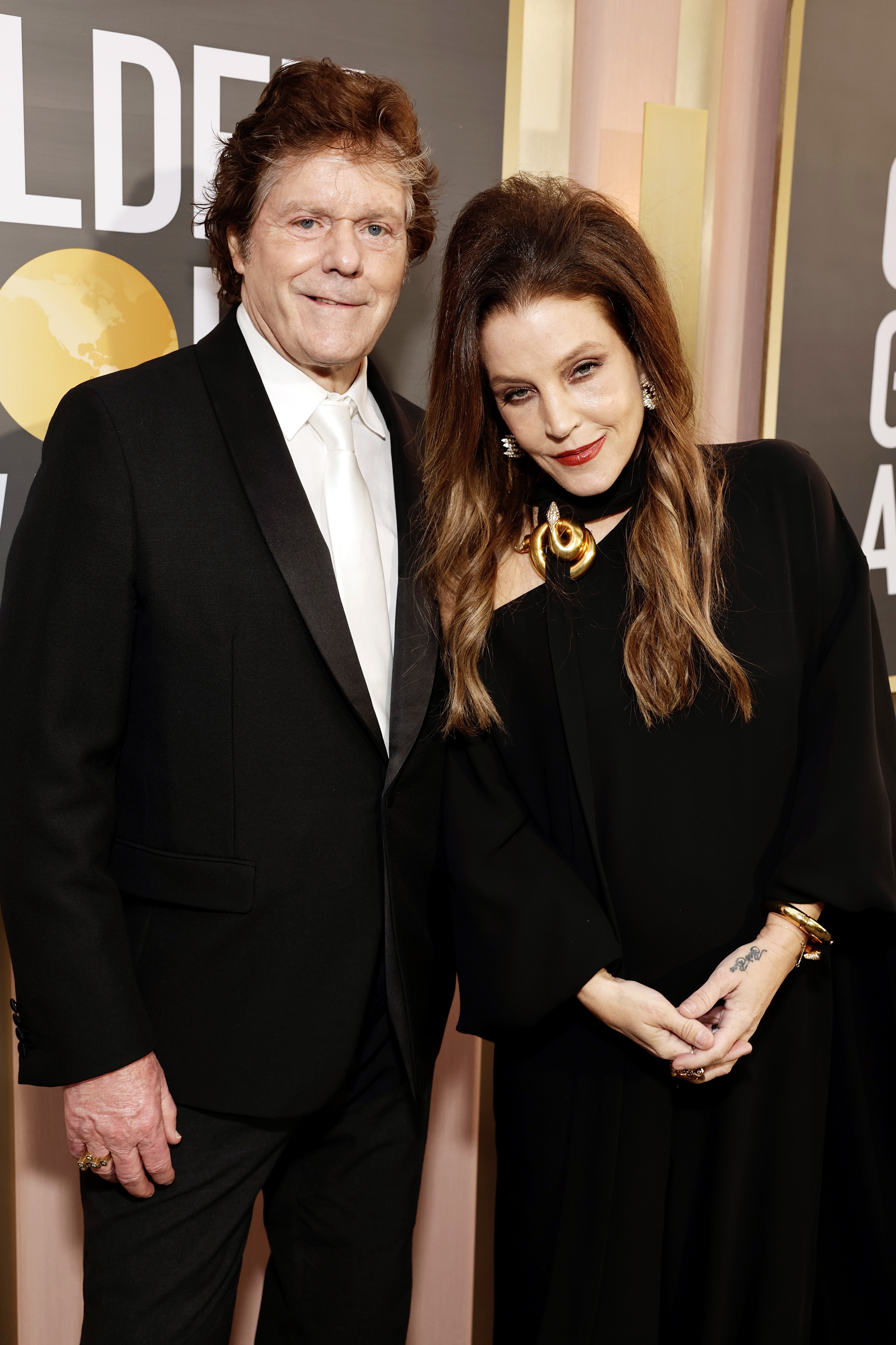 Jerry Schilling and Lisa Marie Presley arrive at the 80th Annual Golden Globe Awards held at the Beverly Hilton Hotel on January 10, 2023 in Beverly Hills, California | Source: Getty Images 