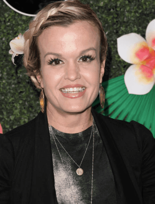 Terra Jole stand infant of a flower wall at the Lifetime's Summer Luau, on May 20, 2019, in Los Angeles, California | Source: Getty Images (Photo by Paul Archuleta/FilmMagic)