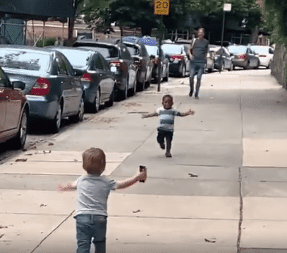 Two two-year-olds, Maxwell and Finnegan seen running to give each other a warm embrace | Photo: Facebook/MichaelDCisnerosNYC