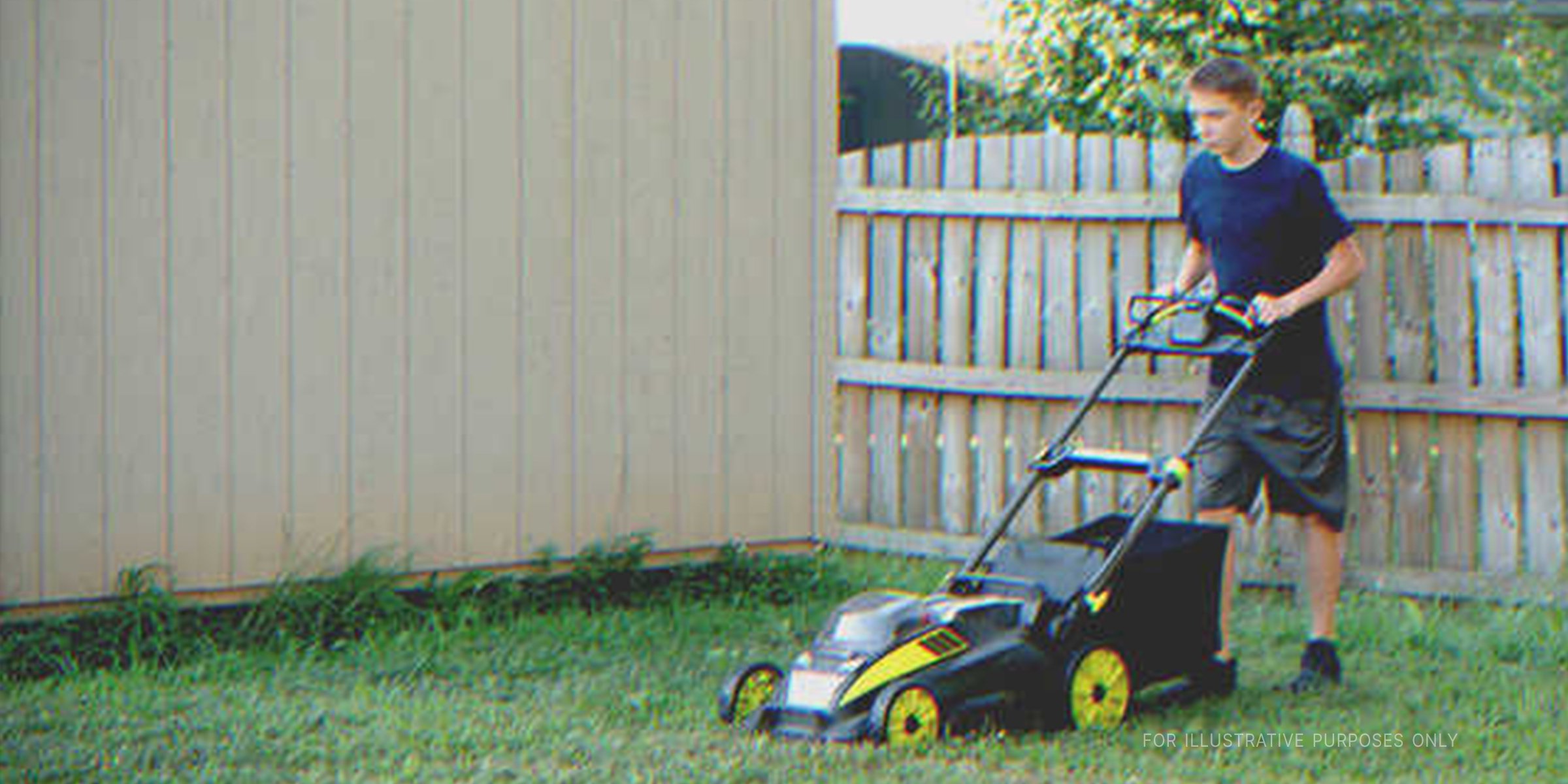 Teen Mowing The Lawn. | Source: Shutterstock