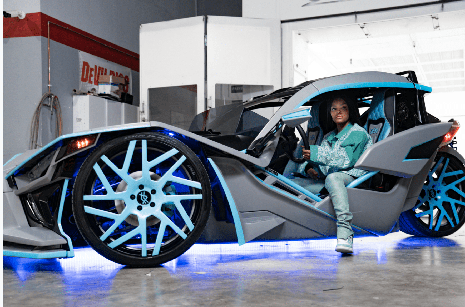 Teyana Taylor with her newly customized Slingshot. |  Photo courtesy of The Auto Firm