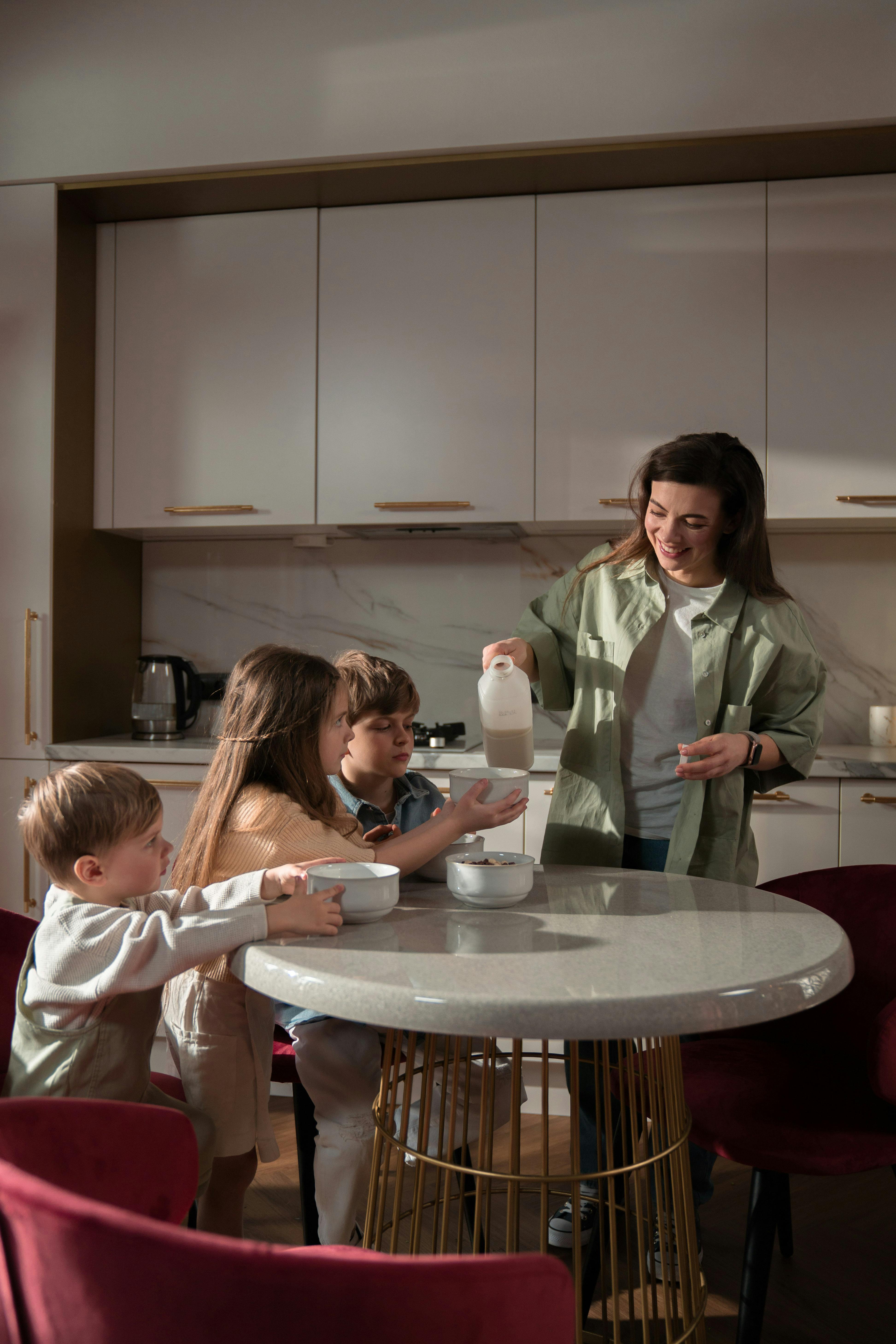 A woman with her children | Source: Pexels