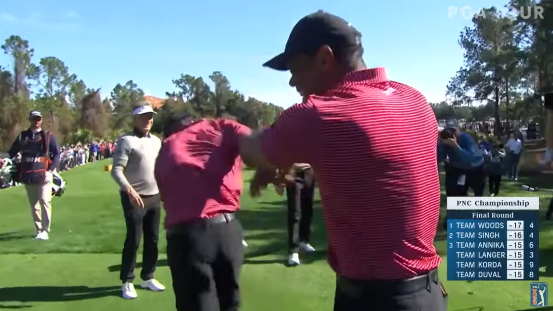 Tiger Woods playfully pushes Charlie after his milestone at the 2024 PNC Championship in Florida, posted on December 23, 2024 | Source: YouTube.com/PGATOUR