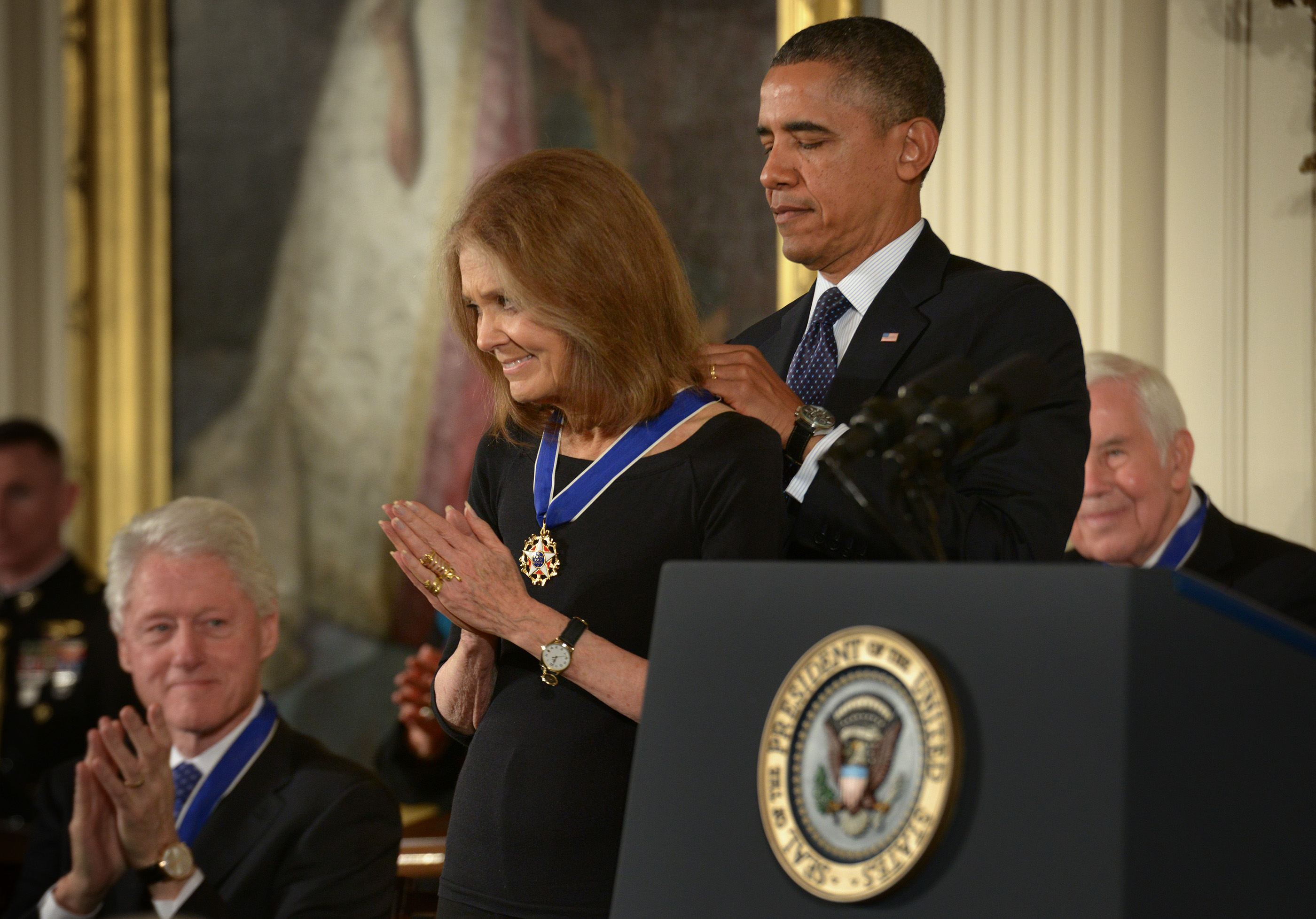 President Barack Obama awards Gloria Steinem the Presidential Medal of Freedom, on November 20, 2013 in Washington, DC. | Source: Getty Images