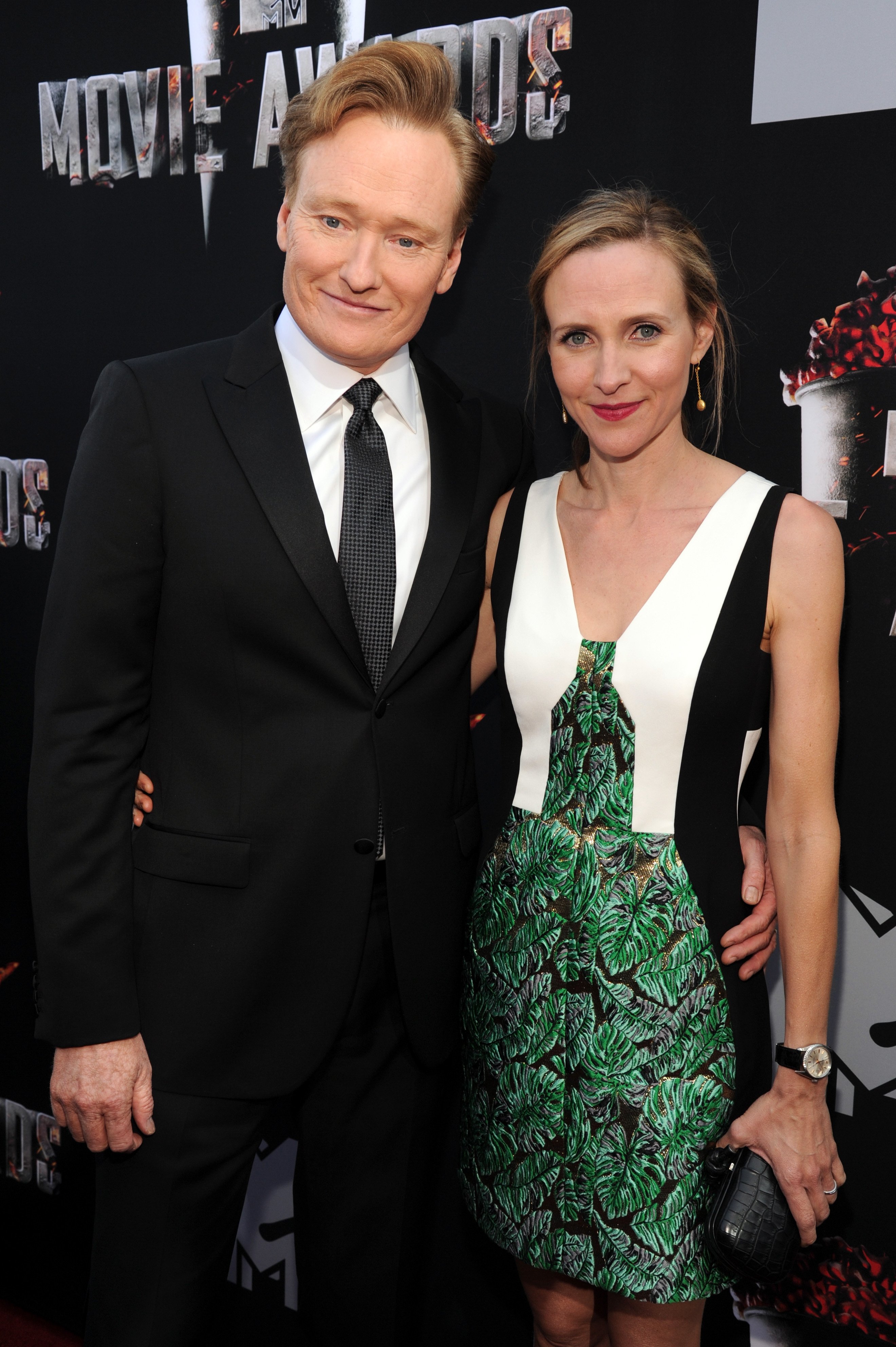Conan O'Brien and Liza Powel O'Brien attend the 2014 MTV Movie Awards at Nokia Theatre L.A. Live on April 13, 2014, in Los Angeles, California. | Source: Getty Images