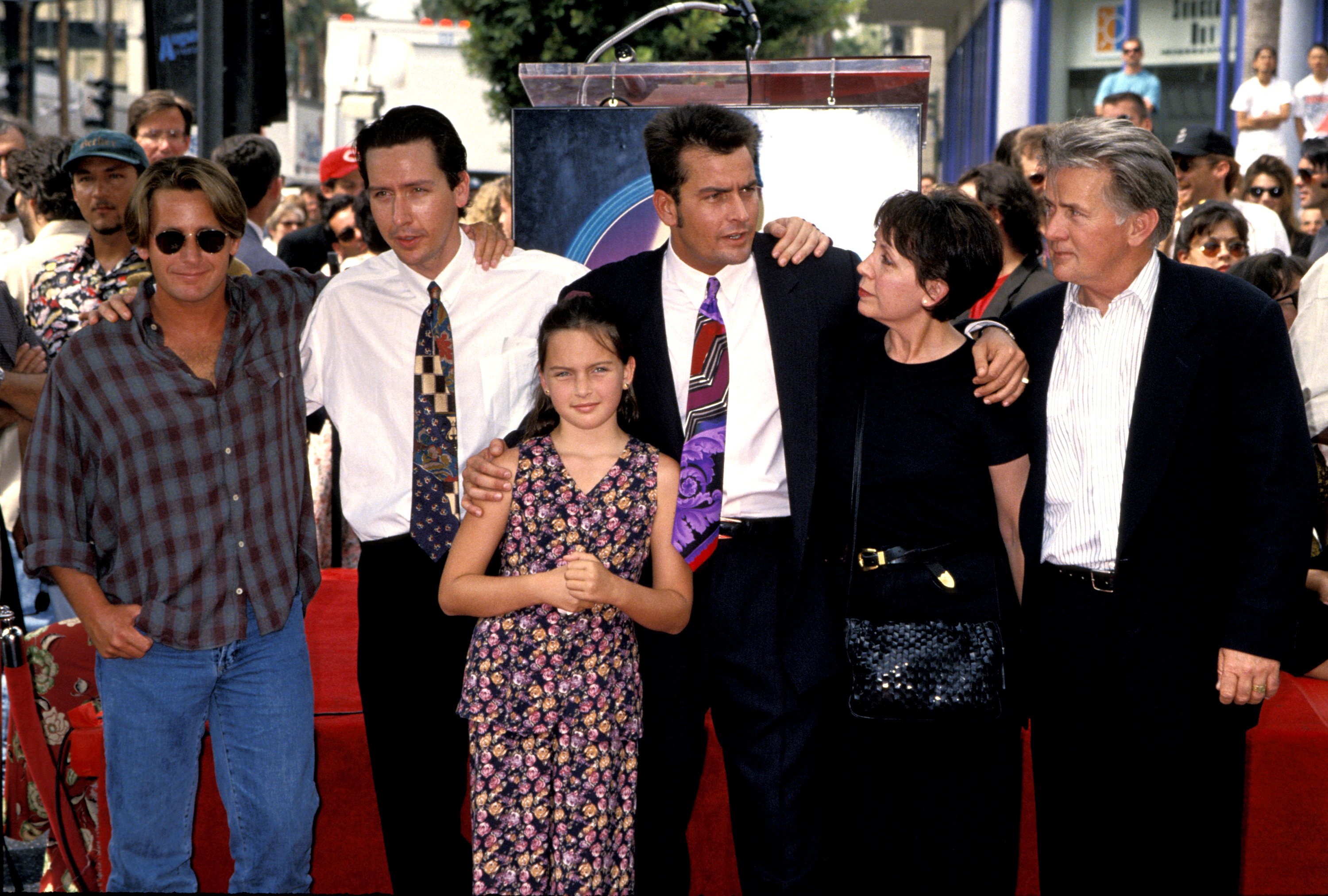Emilio Estevez, Ramon Estevez, Charlie Sheen pictured with their parents Janet Sheen and Martin Sheen. / Source: Getty Images